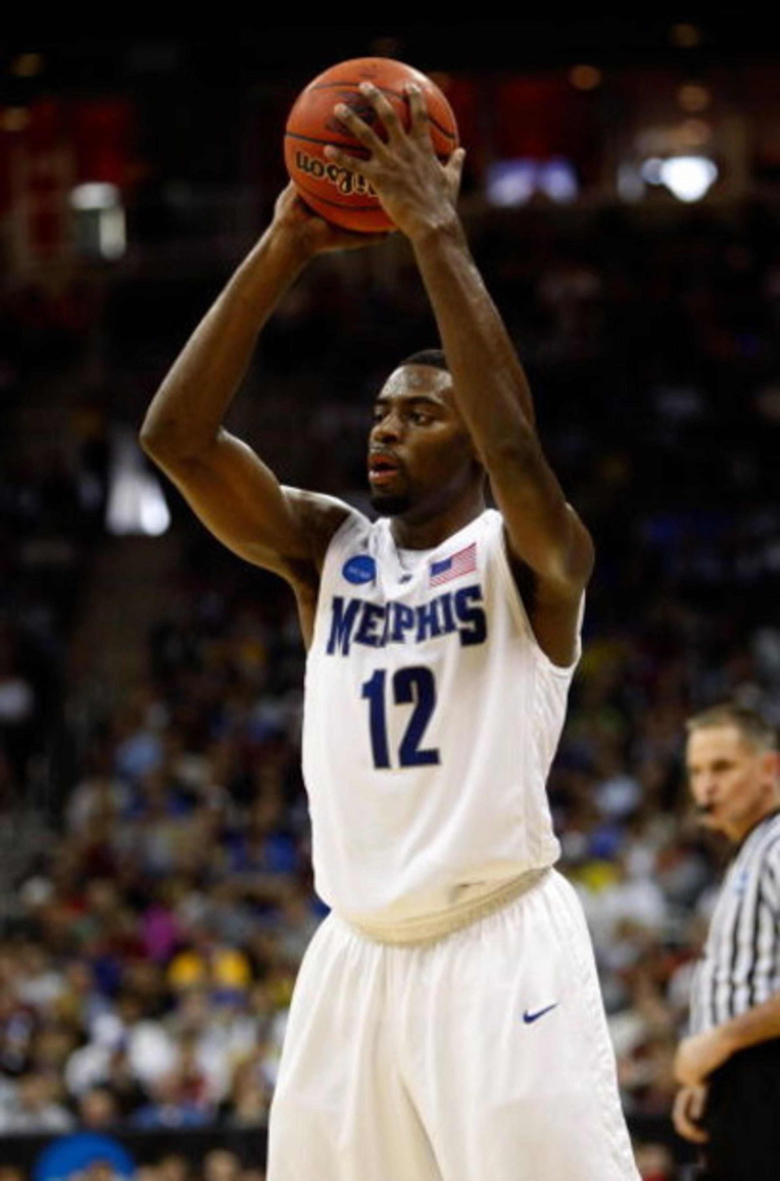 KANSAS CITY, MO - MARCH 21:  Tyreke Evans #12 of the Memphis Tigers looks to make a pass play during their second round game against the Maryland Terrapins in the NCAA Division I Men's Basketball Tournament at the Sprint Center on March 21, 2009 in Kansas
