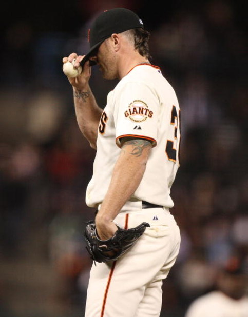 SAN FRANCISCO - MAY 14: Brian Wilson #38 of the San Francisco Giants looks on after giving up three runs in the ninth innintagainst the New York Mets during a Major League Baseball game on May14, 2009 at AT&T Park in San Francisco, California. (Photo by J