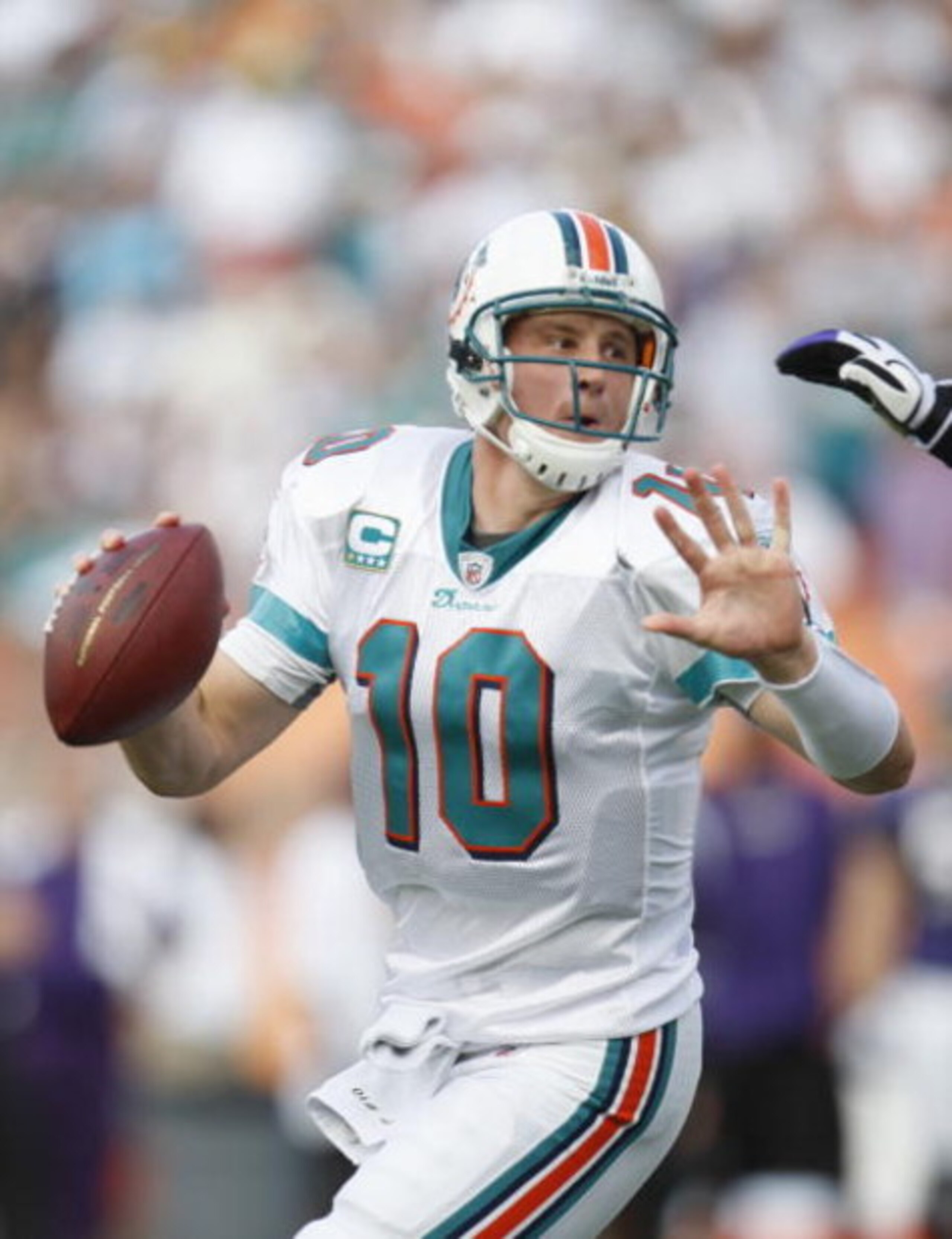MIAMI - JANUARY 4:  Chad Pennington #10 of the Miami Dolphins scrambles during a AFC Wild Card playoff game against the Baltimore Ravens on January 4, 2009 at Dolphin Stadium in Miami, Florida. (Photo by Gregory Shamus/Getty Images)