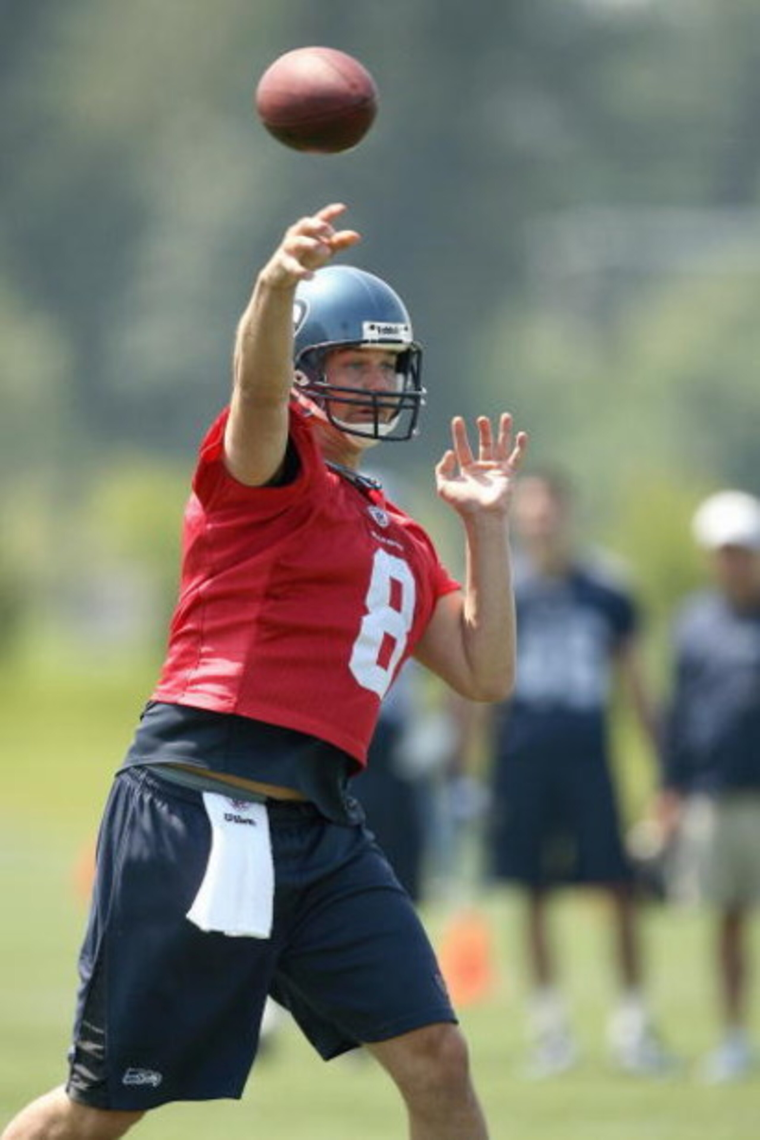 RENTON, WA - JUNE 12:  Quarterback Matt Hasselbeck #8 passes during minicamp at the Seahawks training facility on June 12, 2009 in Renton, Washington. (Photo by Otto Greule Jr/Getty Images)  