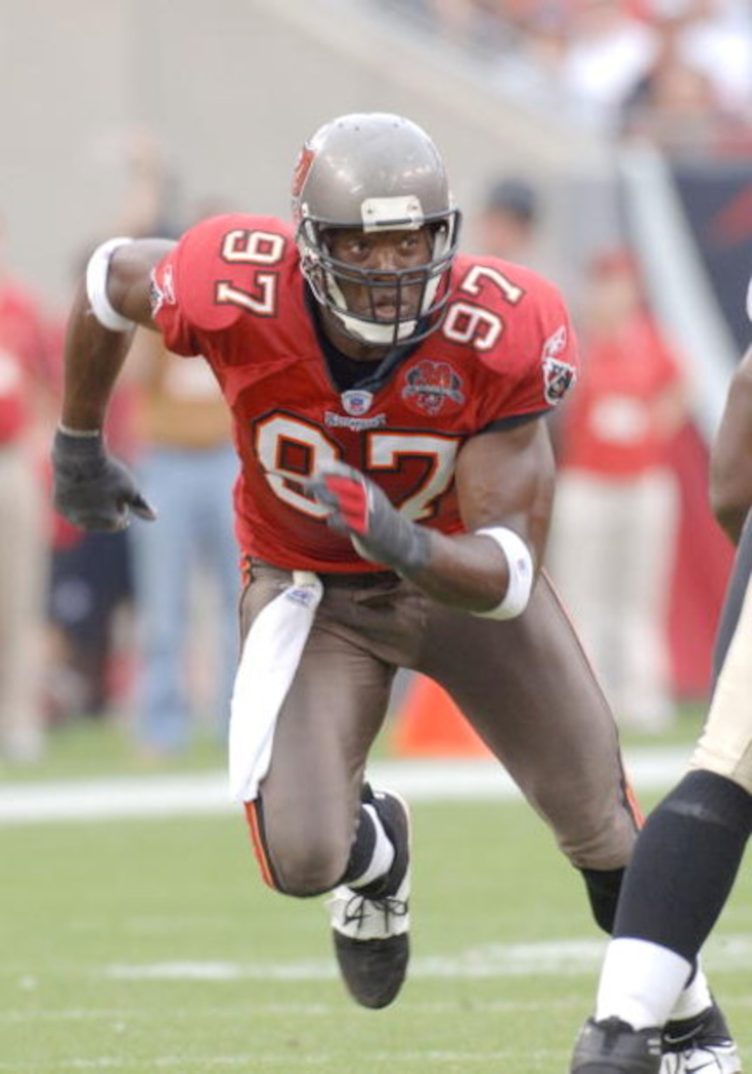 Tampa Bay Buccaneers defensive end Simeon Rice rushes into the backfield against the New Orleans Saints on January 1, 2006 in Tampa. The Bucs defeated the Saints 27 - 13 to win the NFL South Championship and a playoff spot.  (Photo by Al Messerschmidt/Get
