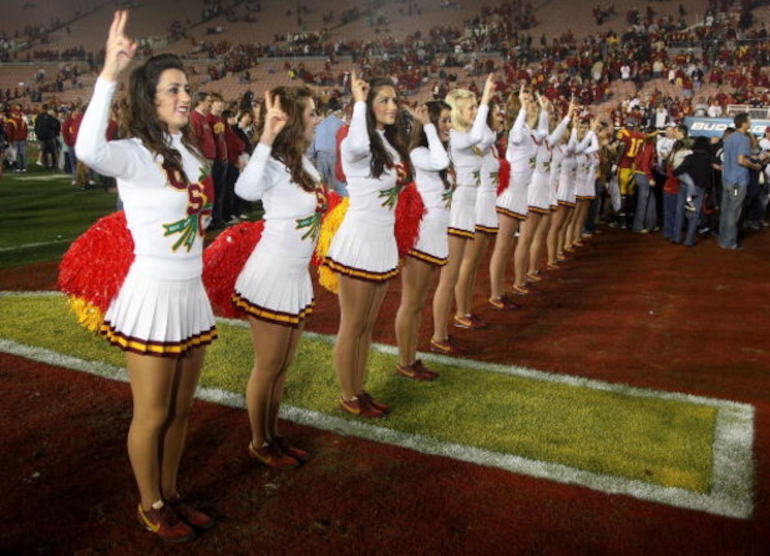 PASADENA, CA - JANUARY 01:  The USC Trojans song girls sing the fight song after the Trojans defeated the Penn State Nittany Lions during the 95th Rose Bowl Game presented by Citi on January 1, 2009 at the Rose Bowl in Pasadena, California.  (Photo by Ste