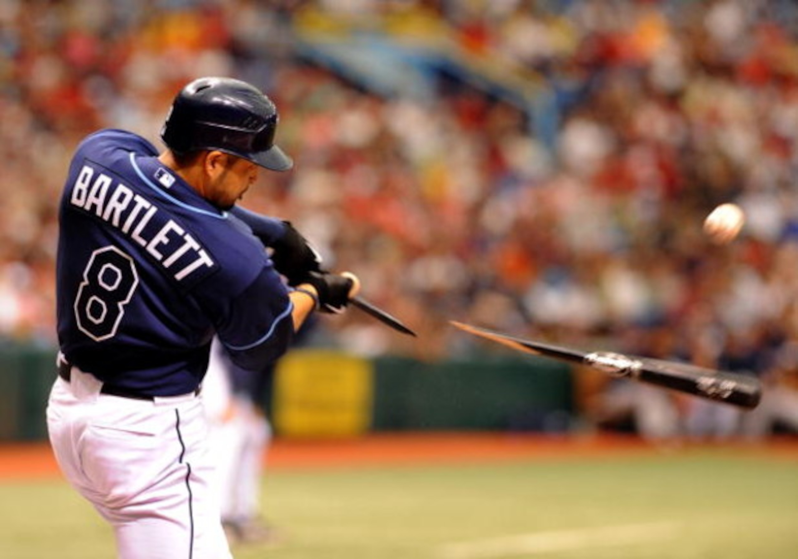 ST. PETERSBURG, FL - MAY 3: Shortstop Jason Bartlett #8 of the Tampa Bay Rays breaks a bat against the Boston Red Sox May 3, 2009 at Tropicana Field in St. Petersburg, Florida. (Photo by Al Messerschmidt/Getty Images)