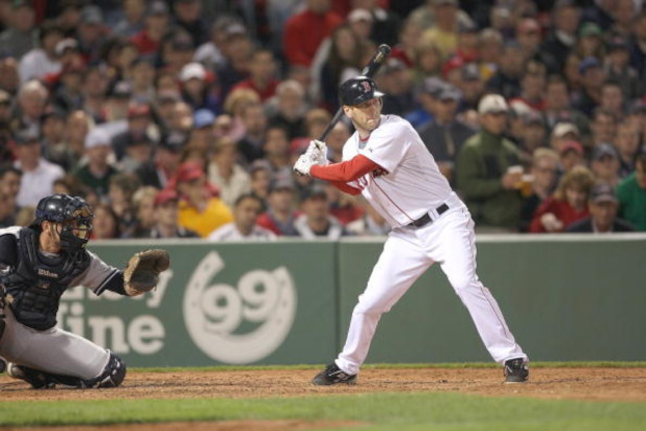 BOSTON - JUNE 11: Jason Bay #44 of the Boston Red Sox makes contact against the New York Yankees at Fenway Park on June 11, 2009 in Boston, Massachusetts.  (Photo by Jim Rogash/Getty Images)