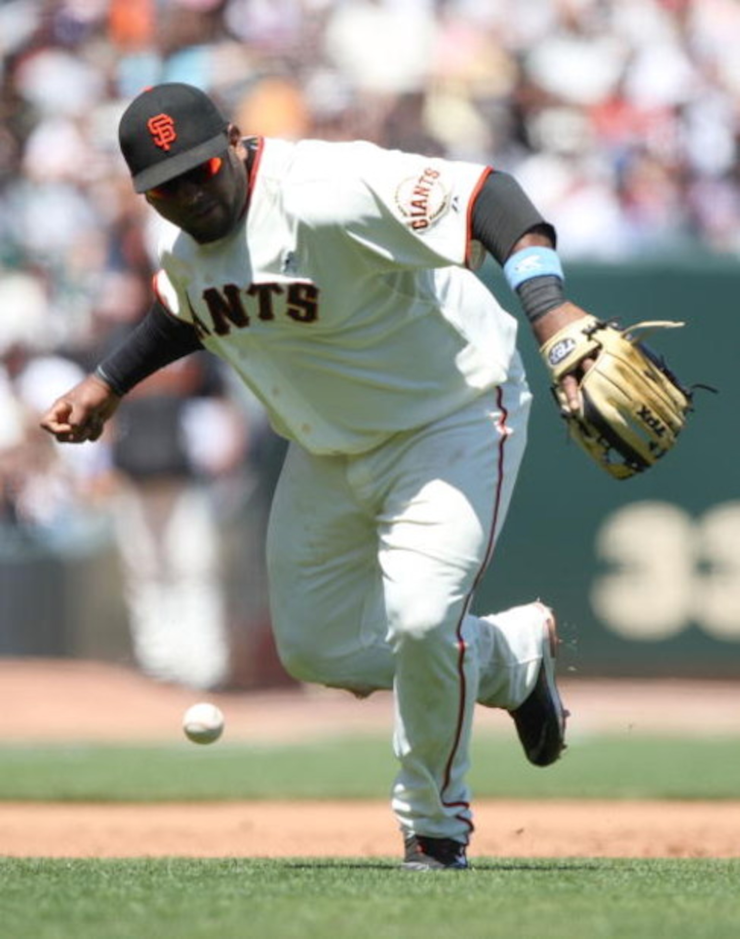 SAN FRANCISCO - JUNE 21: Pablo Sandoval #48 of the San Francisco Giants miss plays a ball against the Texas Rangers during a Major League Baseball game on June 21, 2009 at AT&T Park in San Francisco, California.  (Photo by Jed Jacobsohn/Getty Images)