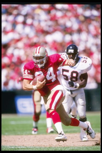 10 Sep 1995:  Tight end Brent Jones of the San Francisco 49ers moves the ball during a game against the Atlanta Falcons during a game at 3Com Park in San Francisco, California.  The 49ers won the game, 41-10. Mandatory Credit: Mike Powell  /Allsport