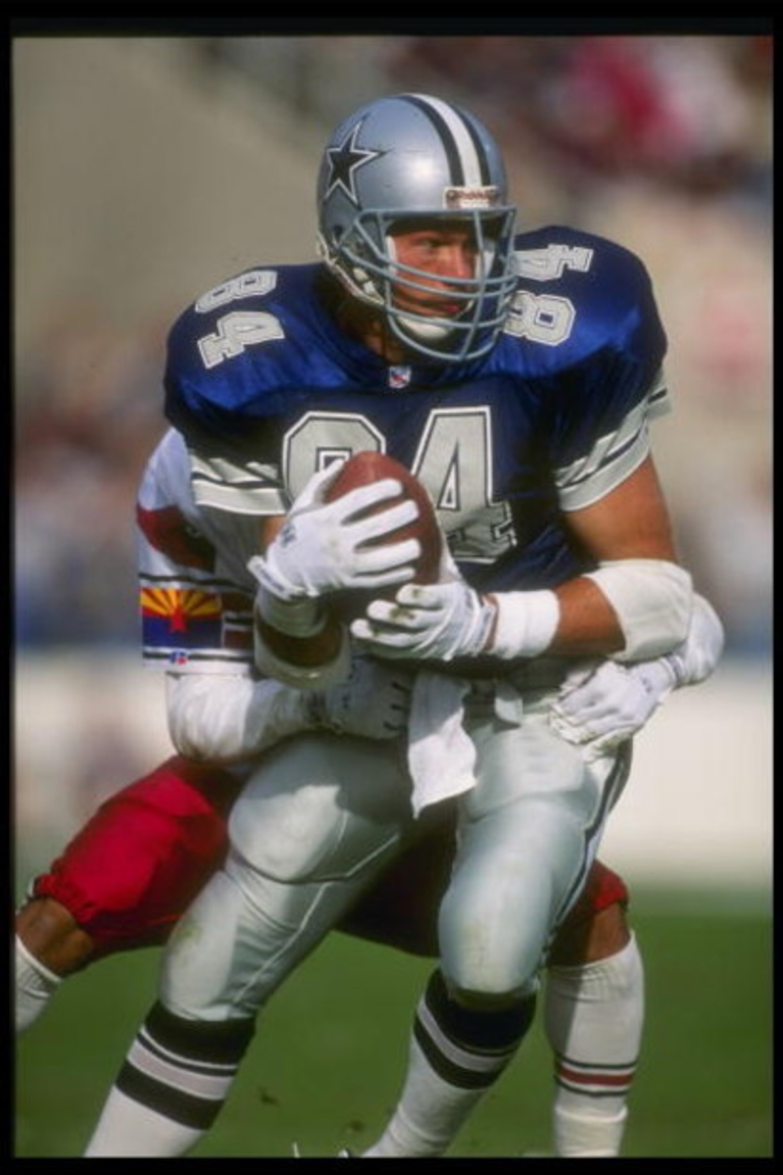 22 Nov 1992:  Tight end Jay Novacek of the Dallas Cowboys moves the ball during a game against the Phoenix Cardinals at Texas Stadium in Irving, Texas.  The Cowboys won the game, 16-10. Mandatory Credit: Mike Powell  /Allsport