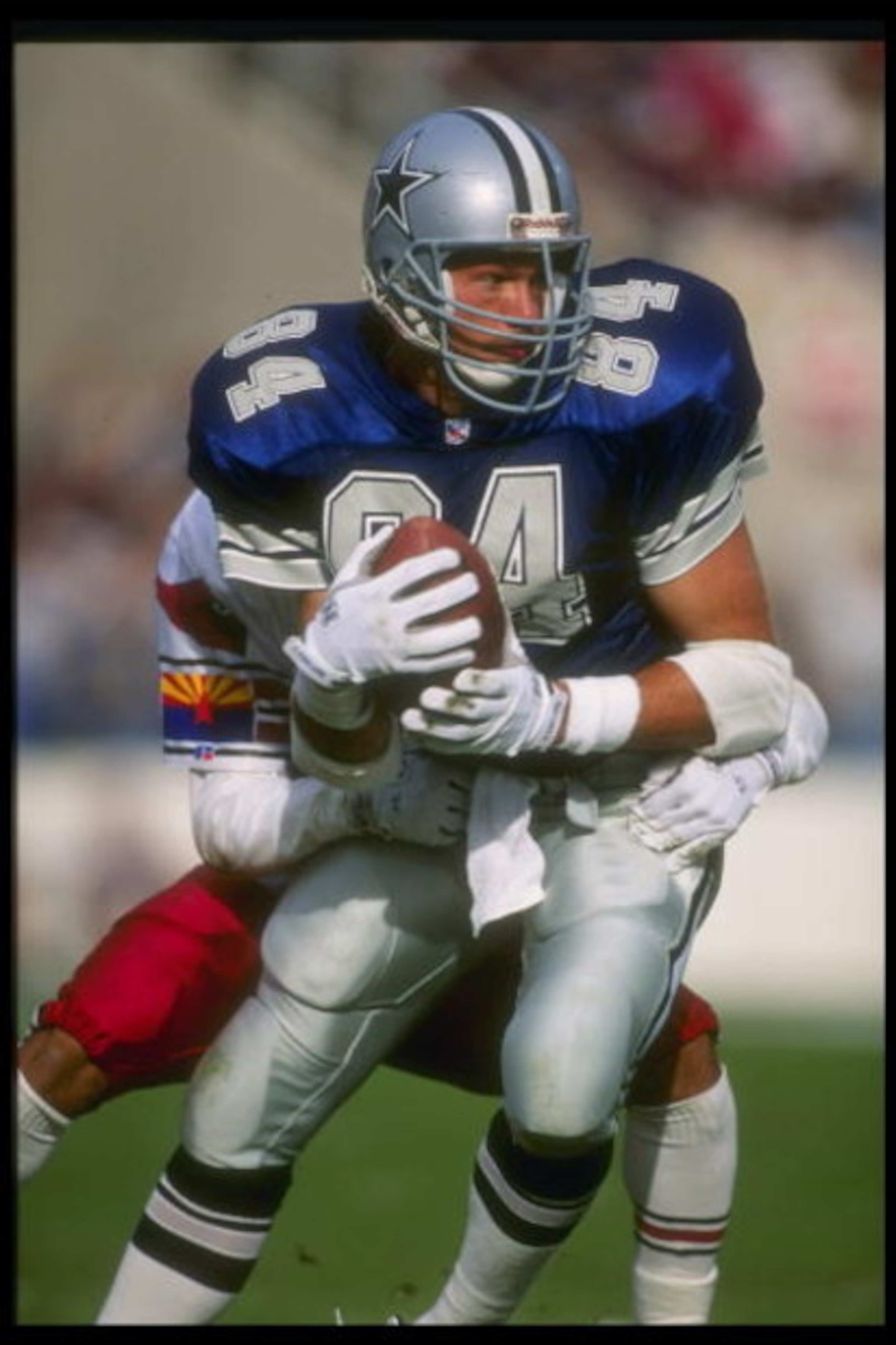 22 Nov 1992: Tight end Jay Novacek of the Dallas Cowboys moves the ball during a game against the Phoenix Cardinals at Texas Stadium in Irving, Texas. The Cowboys won the game, 16-10. Mandatory Credit: Mike Powell /Allsport 22 Nov 1992: Tight end Jay Novacek of the Dallas Cowboys moves the ball during a game against the Phoenix Cardinals at Texas Stadium in Irving, Texas. The Cowboys won the game, 16-10. Mandatory Credit: Mike Powell /Allsport
