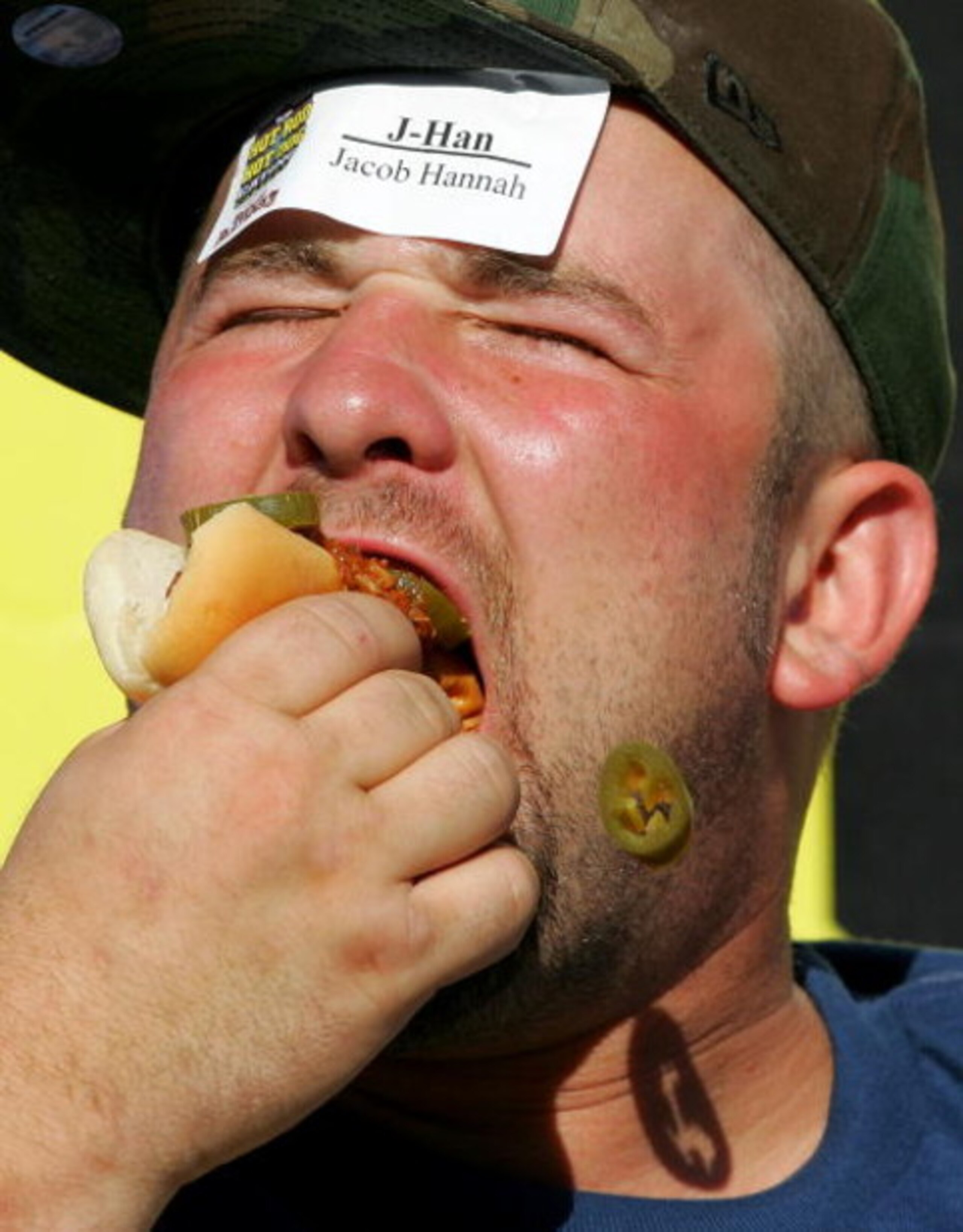 FORT WORTH, TX - JUNE 07:  Jacob Hannah competes in a hot dog eating contest, prior to the IRL IndyCar Series Bombardier Learjet 550k on June 7, 2008 at the Texas Motor Speedway in Fort Worth, Texas.  (Photo by Streeter Lecka/Getty Images)