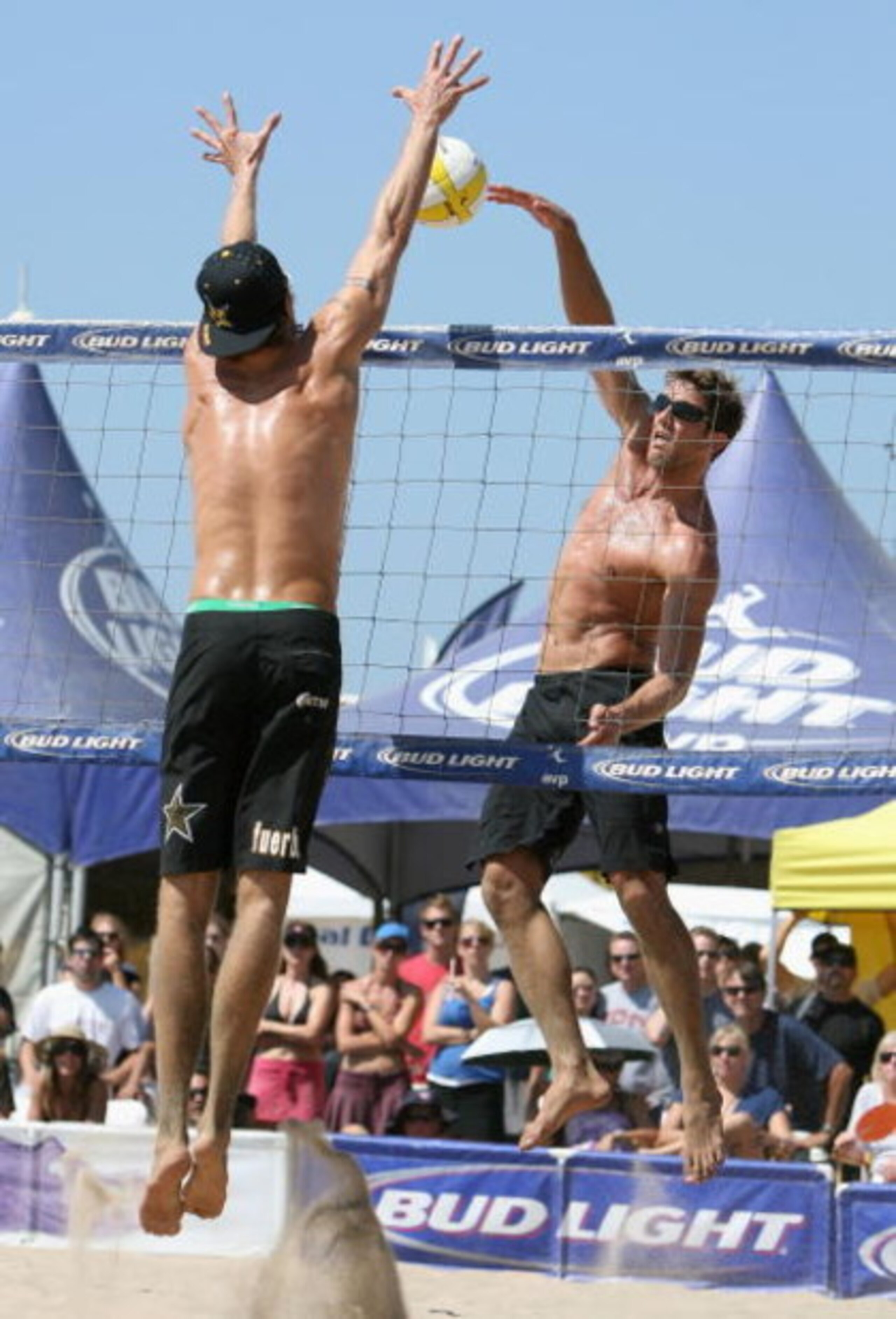 MANHATTAN BEACH, CA - SEPTEMBER 21:  Sean Scott hits against Matt Fuerbringer in the AVP Manhattan Beach Open semi final match on September 21, 2008 at the pier in Manhattan Beach, California. Nick Lucena and Sean Scott defeated Matt Fuerbringer and Casey