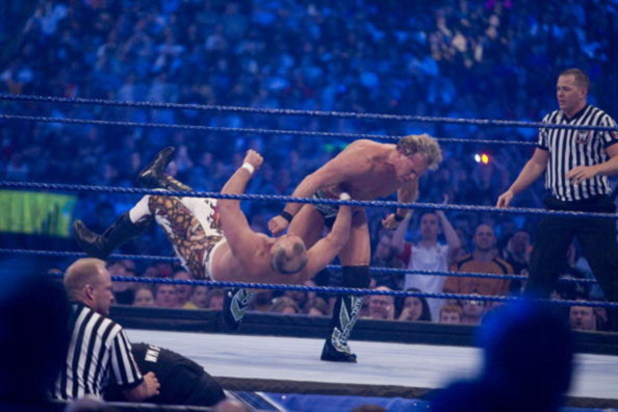 HOUSTON, TX - APRIL 5:  (L-R) Former professional wrestler Ricky 'The Dragon' Steamboat gets thrown to the mat by WWE Superstar Chris Jericho during WrestleMania 25 at Reliant Stadium on April 5, 2009 in Houston, Texas.  (Photo by Bill Olive/Getty Images)