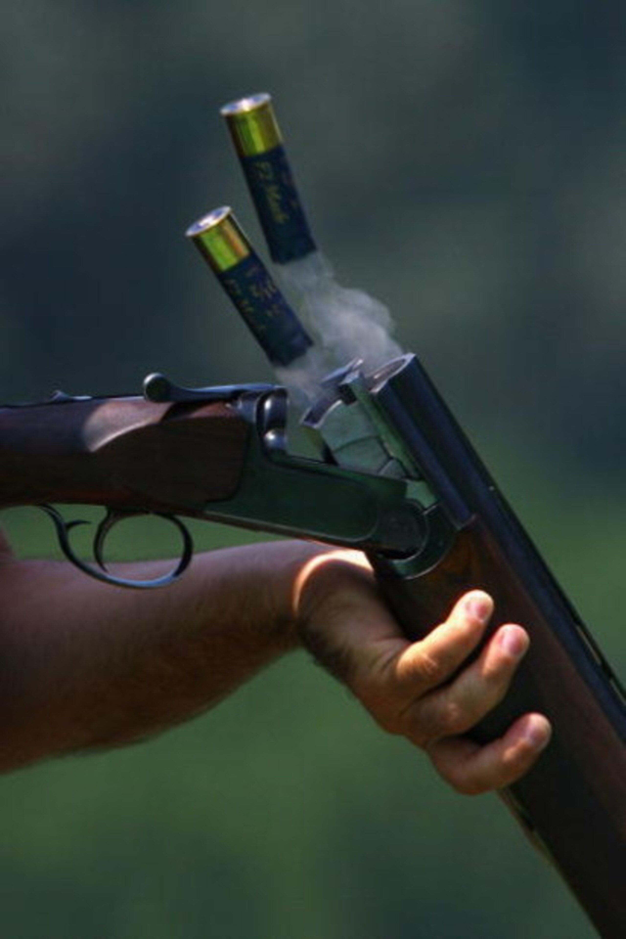 BEIJING - AUGUST 03:  Cartridges pop out of a Shotgun as a competitor practices ahead of the Beijing 2008 Olympics at the Beijing Shooting Range CTF on August 3, 2008 in Beijing, China.  (Photo by Julian Finney/Getty Images)