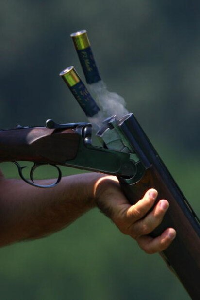 BEIJING - AUGUST 03:  Cartridges pop out of a Shotgun as a competitor practices ahead of the Beijing 2008 Olympics at the Beijing Shooting Range CTF on August 3, 2008 in Beijing, China.  (Photo by Julian Finney/Getty Images)