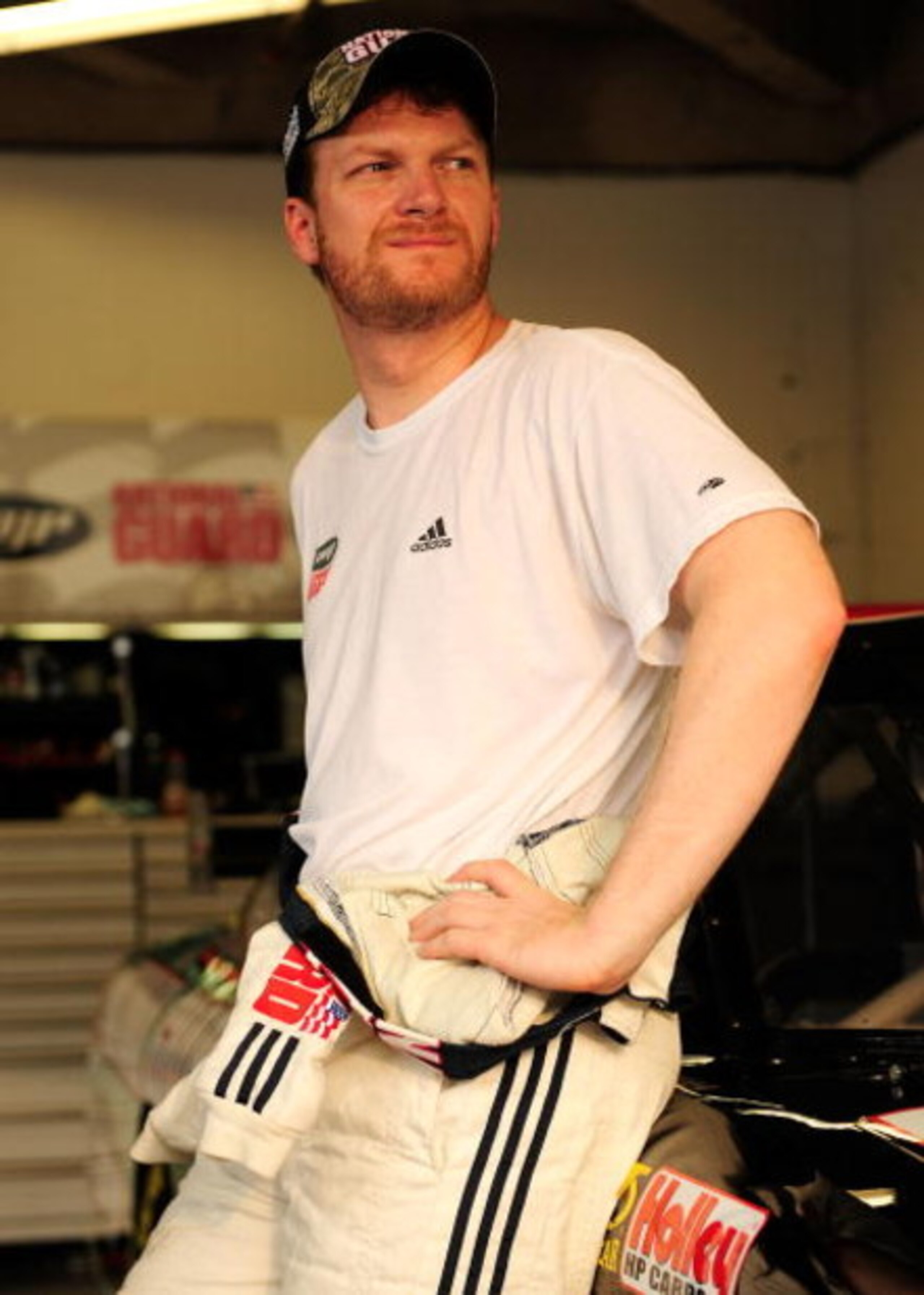 DAYTONA BEACH, FL - JULY 02:  Dale Earnhardt Jr, driver of the #88 National Guard/AMP Energy Chevrolet, stands in the garage during practice for the NASCAR Sprint Cup Series Coke Zero 400 at Daytona International Speedway on July 2, 2009 in Daytona Beach,