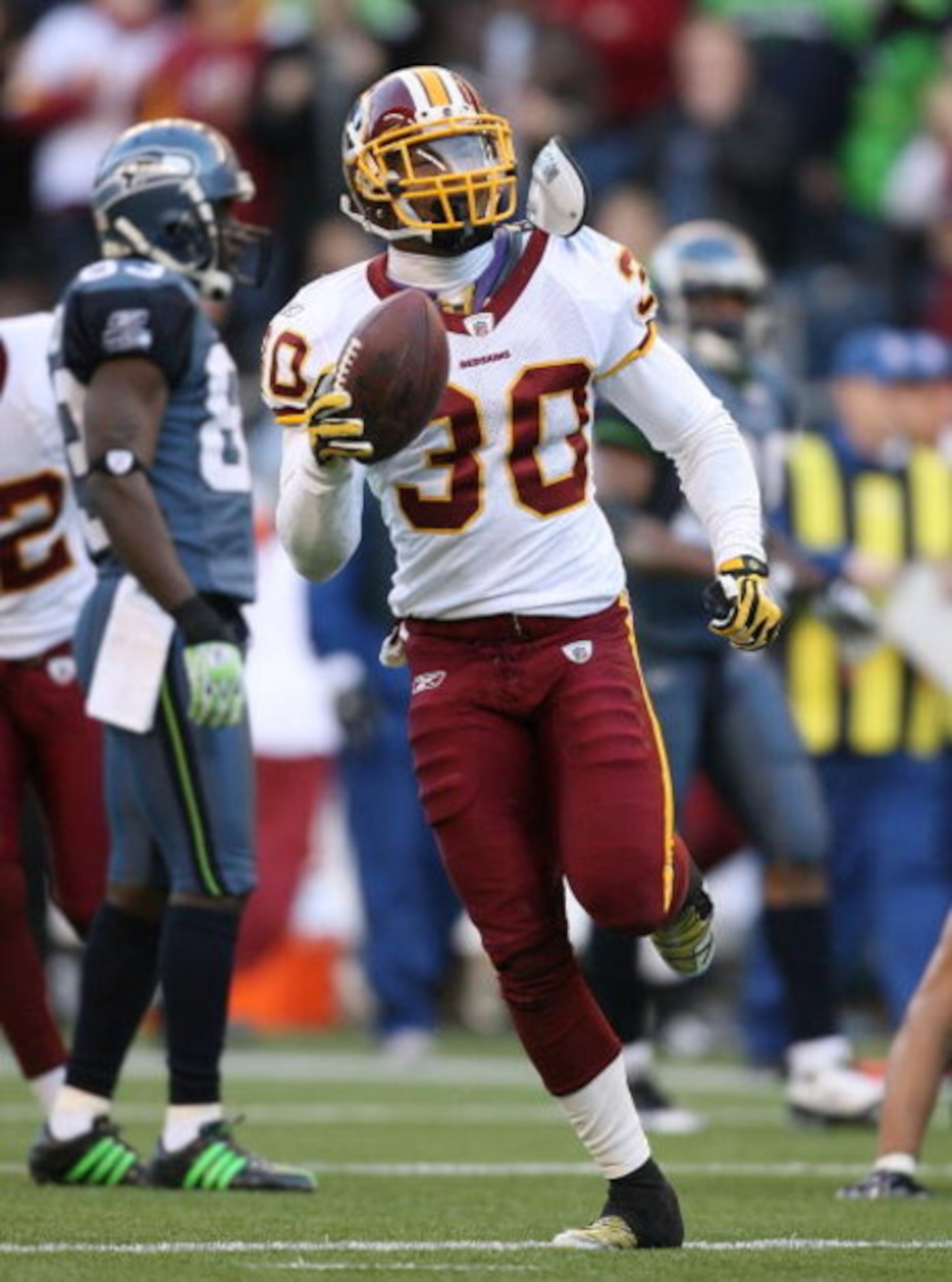 SEATTLE - NOVEMBER 23:  Safety LaRon Landry #30 of the Washington Redskins celebrates after making an interception  against the Seattle Seahawks on November 23, 2008 at Qwest Field in Seattle, Washington. The Redskins defeated the  20-17. (Photo by Otto G