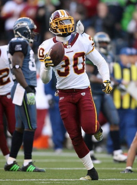 SEATTLE - NOVEMBER 23:  Safety LaRon Landry #30 of the Washington Redskins celebrates after making an interception  against the Seattle Seahawks on November 23, 2008 at Qwest Field in Seattle, Washington. The Redskins defeated the  20-17. (Photo by Otto G