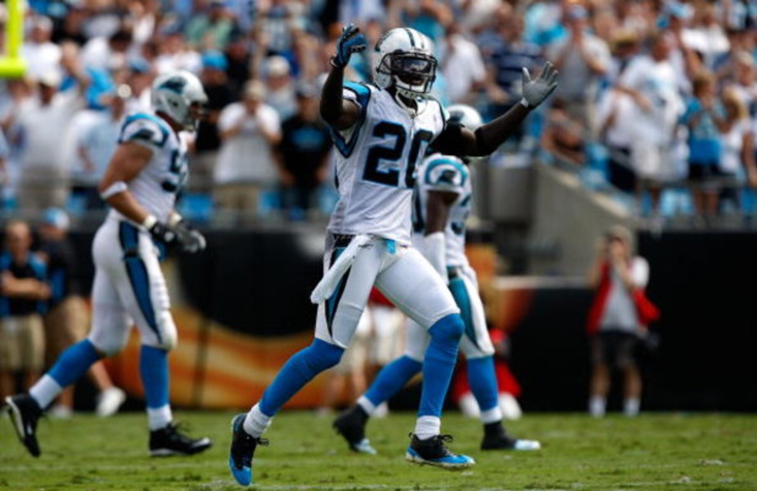 CHARLOTTE, NC - SEPTEMBER 14:  Chris Gamble #20 of the Carolina Panthers reacts to a defensive stop against the Chicago Bears during their game at Bank of America Stadium on September 14, 2008 in Charlotte, North Carolina.  (Photo by Streeter Lecka/Getty 