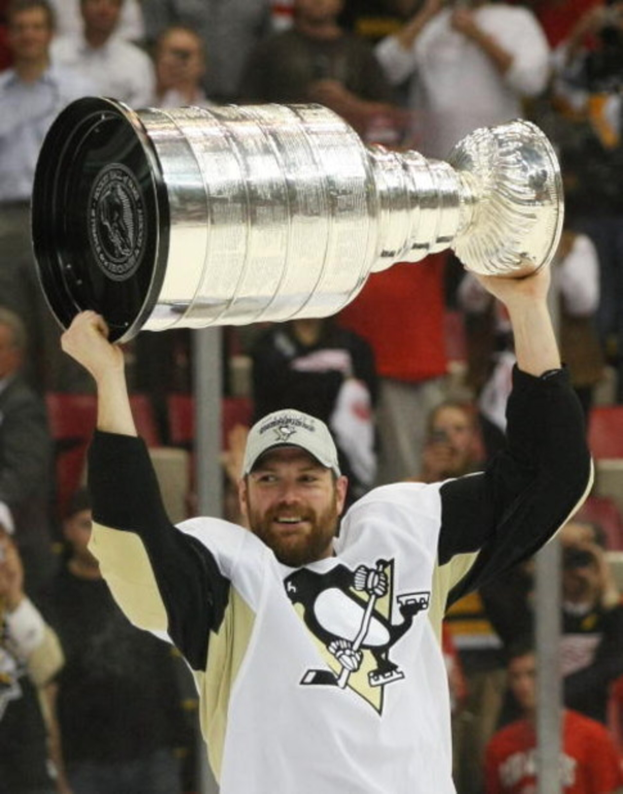 DETROIT - JUNE 12: Hal Gill #2 of the Pittsburgh Penguins holds the Stanley Cup following the Penguins victory over the Detroit Red Wings in Game Seven of the 2009 NHL Stanley Cup Finals at Joe Louis Arena on June 12, 2009 in Detroit, Michigan. (Photo by 