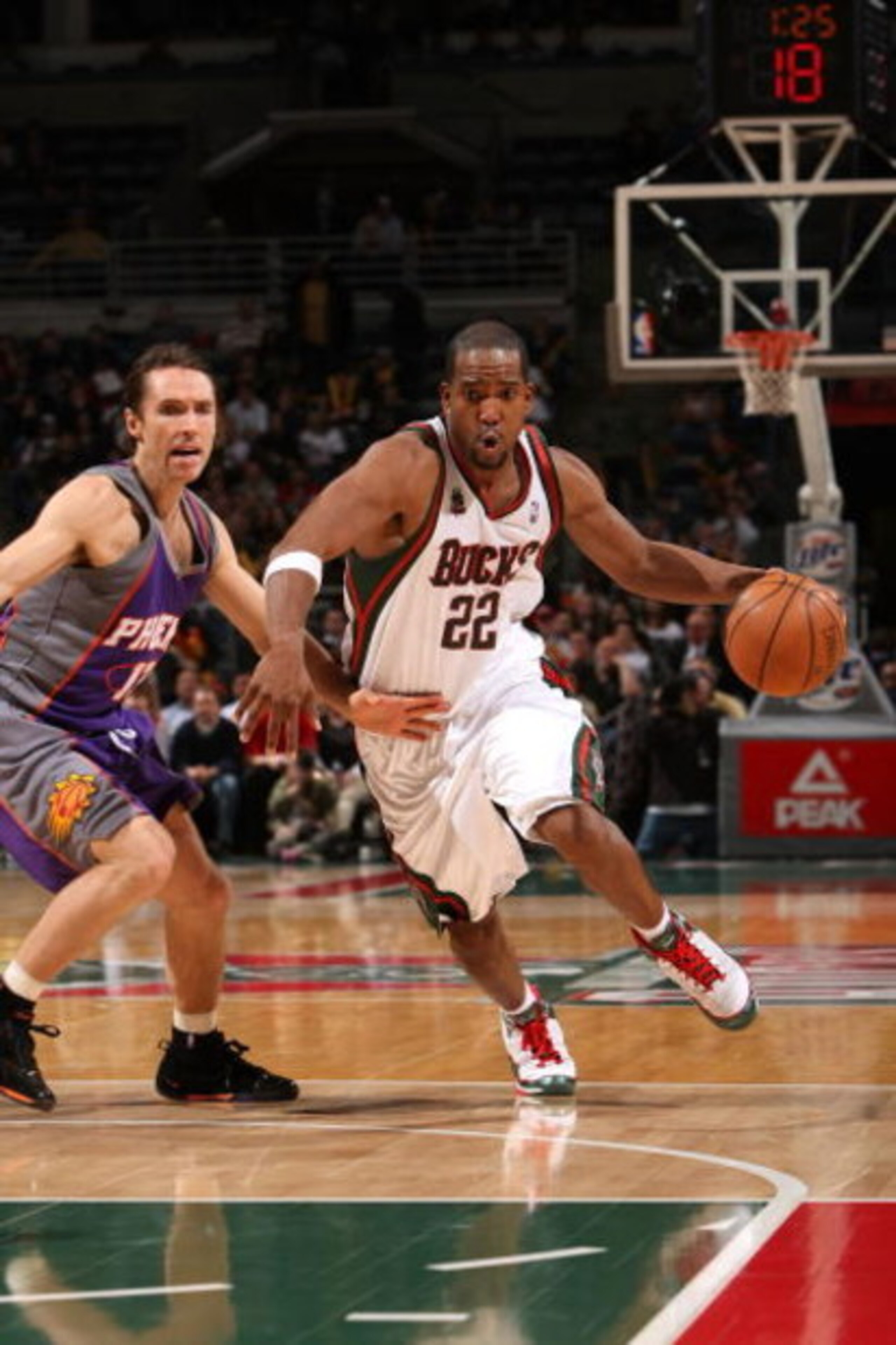 MILWAUKEE - JANUARY 22:  Michael Redd #22 of the Milwaukee Bucks drives against Steve Nash #13 of the Phoenix Suns at the Bradley Center on January 22, 2008 in Milwaukee, Wisconsin. The Suns won 114-105. NOTE TO USER: User expressly acknowledges and agree