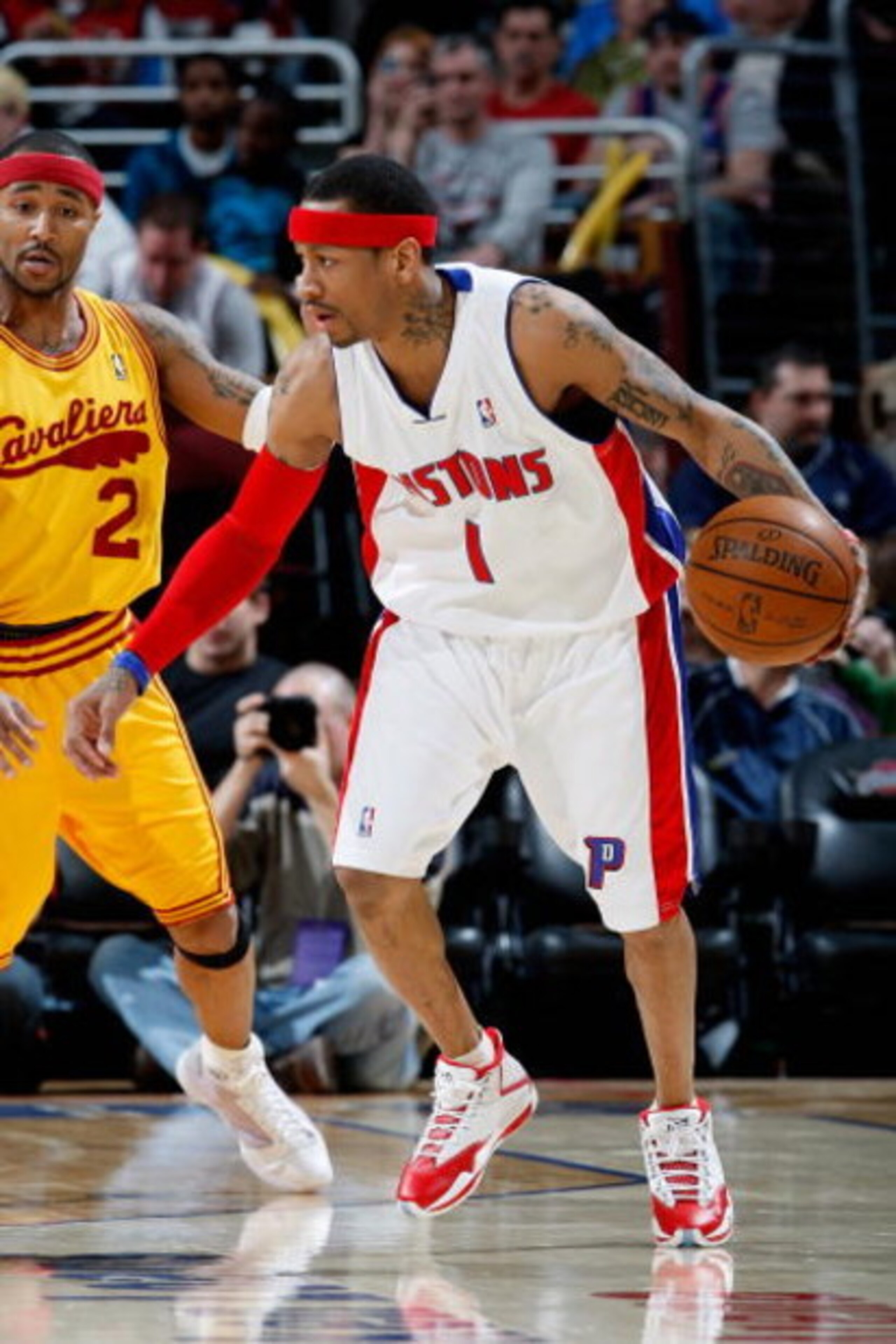 CLEVELAND - FEBRUARY 22:  Allen Iverson #1 of the Detroit Pistons moves past Mo Williams #2 of the Cleveland Cavaliers during the game on February 22, 2009 at the Quicken Loans Arena in Cleveland, Ohio.  The Cavaliers won 99-78.  NOTE TO USER: User expres