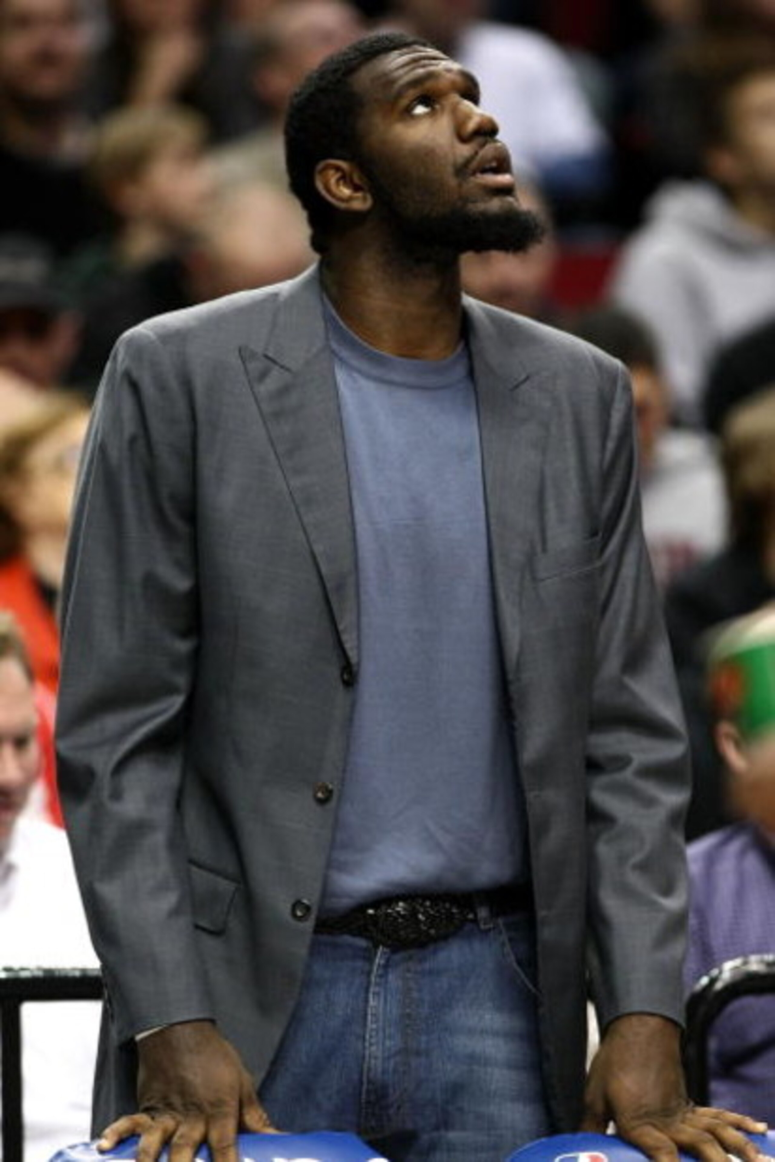 PORTLAND, OR - NOVEMBER 06:  Injured center Greg Oden of the Portland Trail Blazers  watches the game against the Houston Rockets at the Rose Garden on November 6, 2008 in Portland, Oregon.  NOTE TO USER: User expressly acknowledges and agrees that, by do
