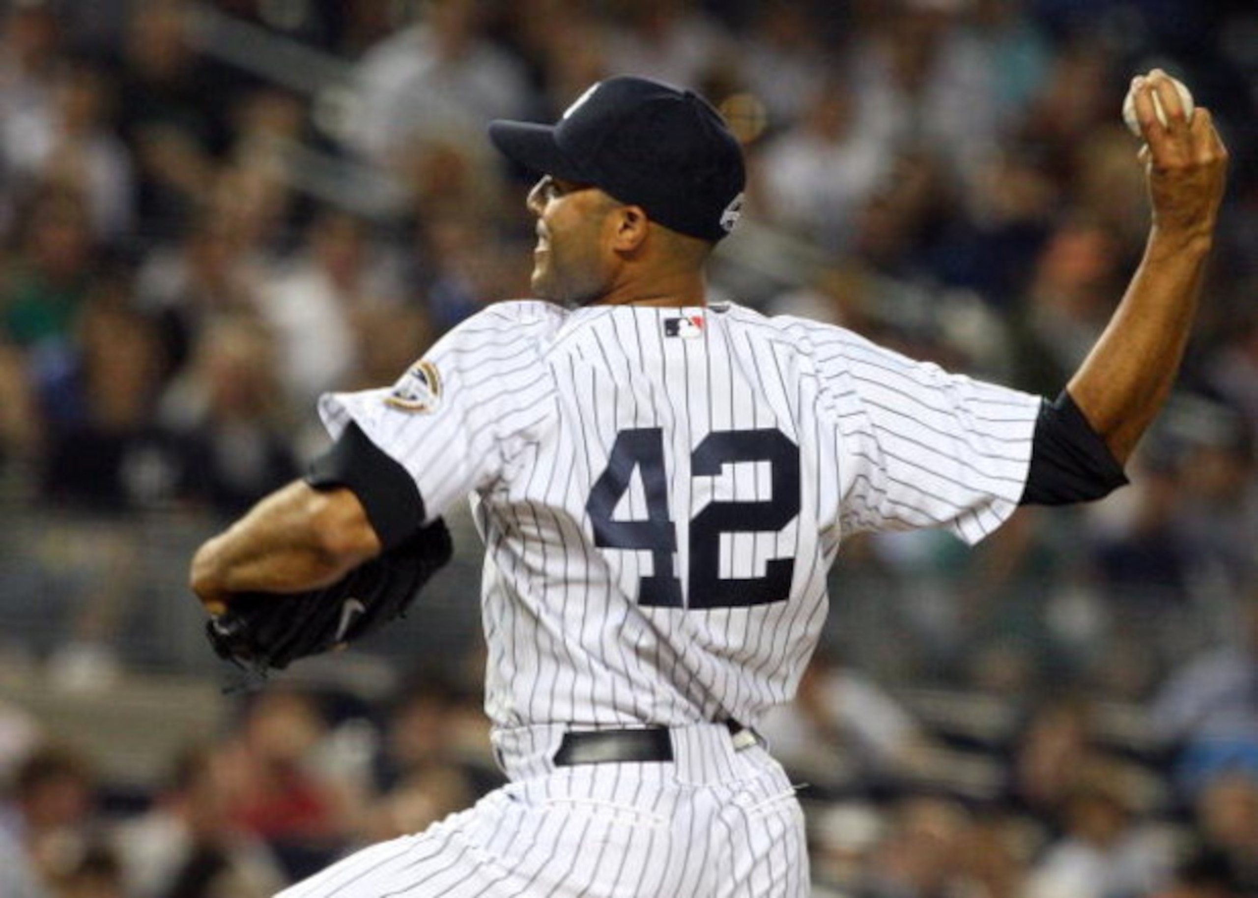 NEW YORK - JULY 01:  Mariano Rivera #42 of the New York Yankees pitches against the Seattle Mariners on July 1, 2009 at Yankee Stadium in the Bronx borough of New York City. The Yankees defeated the Mariners 4-2.  (Photo by Jim McIsaac/Getty Images)