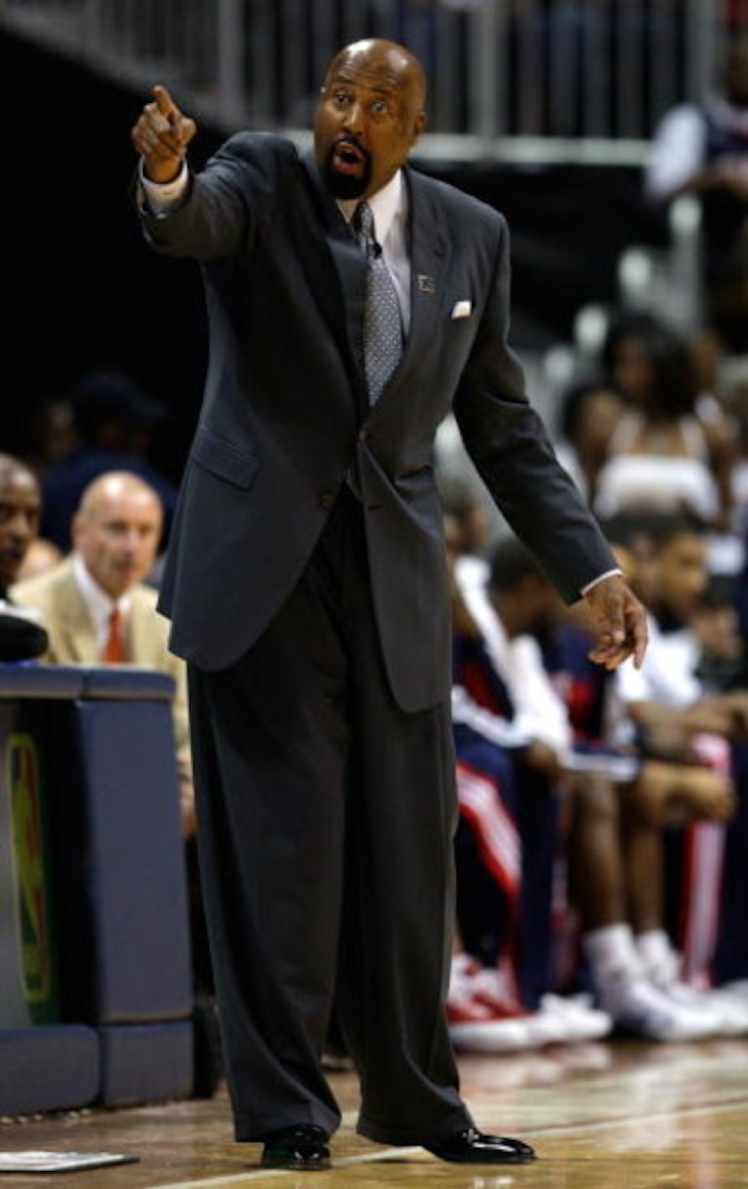 ATLANTA - MAY 09:  Head coach Mike Woodson of the Atlanta Hawks yells to his team against the Cleveland Cavaliers in Game Three of the Eastern Conference Semifinals during the 2009 NBA Playoffs at Philips Arena on May 9, 2009 in Atlanta, Georgia.  NOTE TO