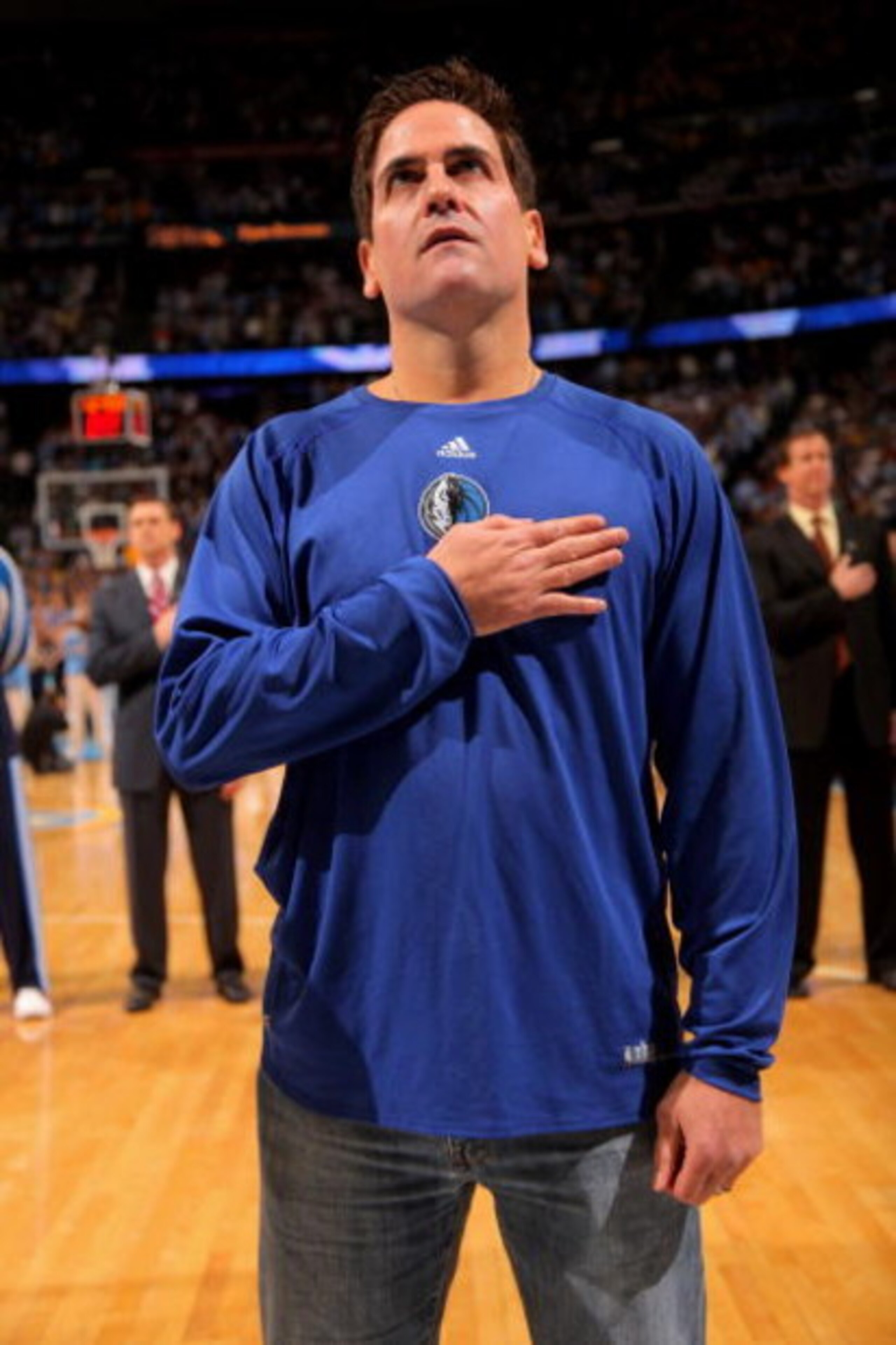 DENVER - MAY 05:  Mark Cuban, owner of the Dallas Mavericks observes the national anthem prior to facing the Denver Nuggets in Game Two of the Western Conference Semifinals during the 2009 NBA Playoffs at Pepsi Center on May 5, 2009 in Denver, Colorado. T
