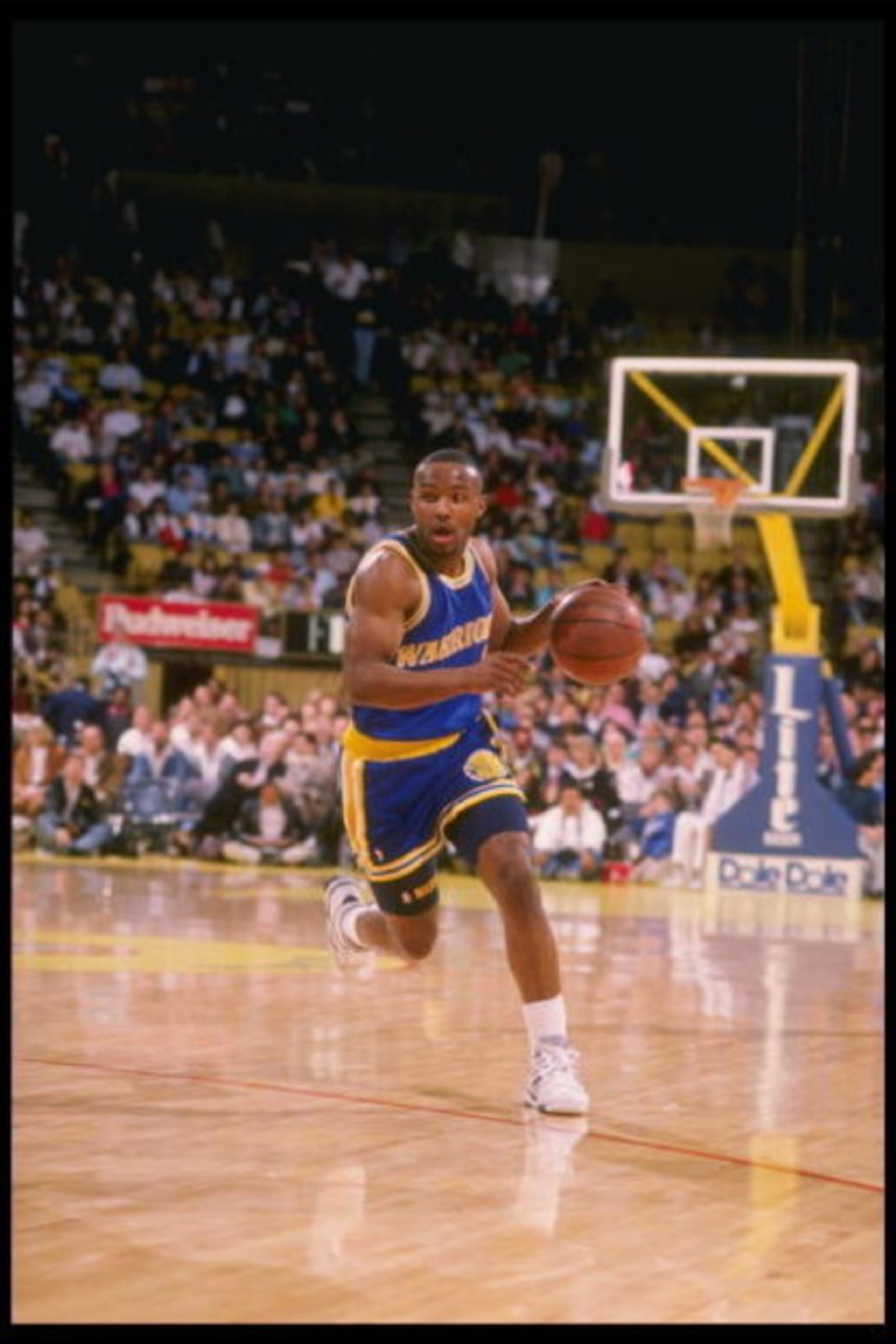 1989-1990:  Guard Tim Hardaway of the Golden State Warriors drives the ball down the court. Mandatory Credit: Ken Levine  /Allsport