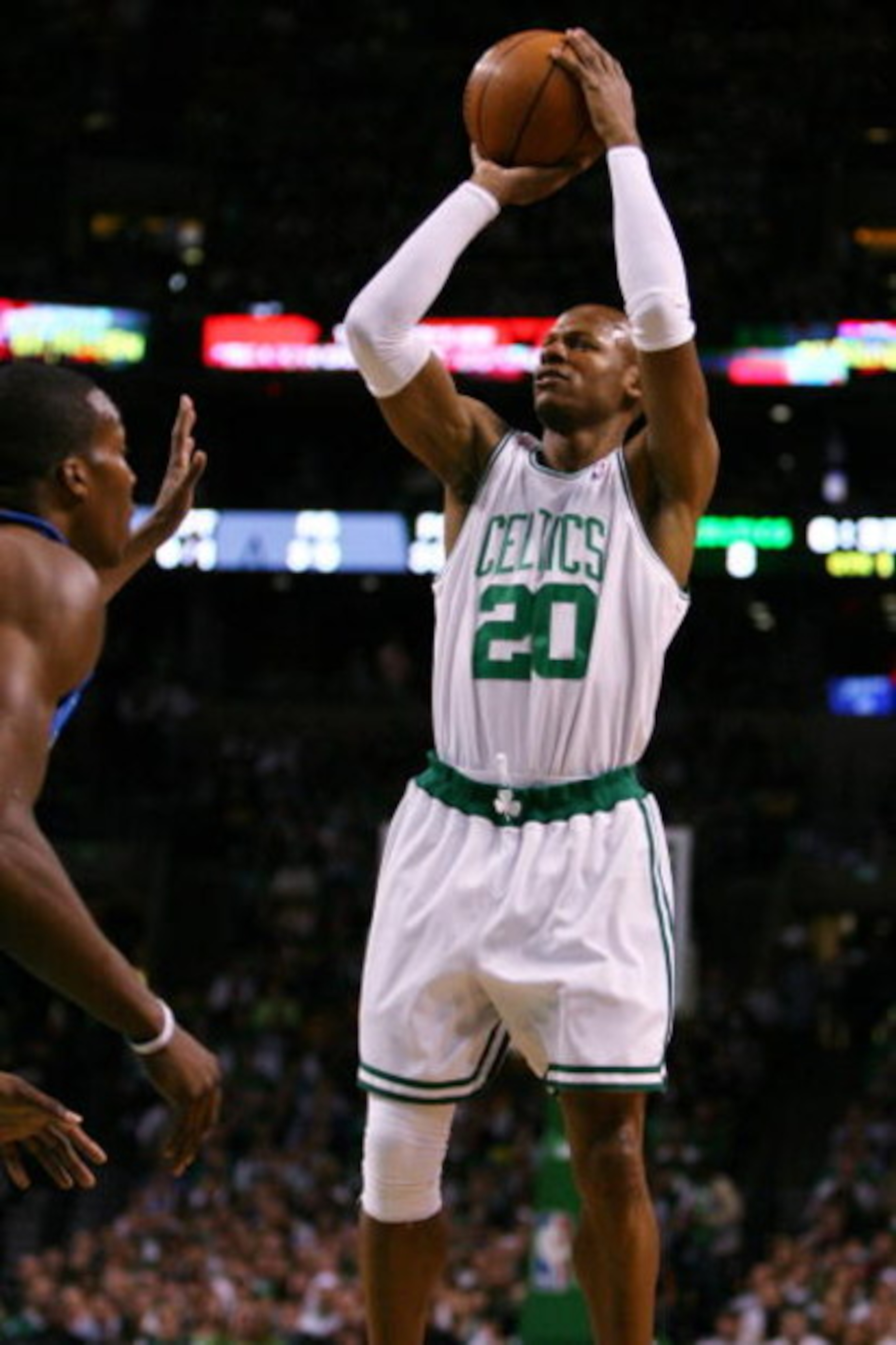 BOSTON - MAY 12: Ray Allen #20 of the Boston Celtics takes a shot in the first quarter against the Orlando Magic in Game Five of the Eastern Conference Semifinals during the 2009 NBA Playoffs at TD Banknorth Garden May 12, 2009 in Boston, Massachusetts. BOSTON - MAY 12: Ray Allen #20 of the Boston Celtics takes a shot in the first quarter against the Orlando Magic in Game Five of the Eastern Conference Semifinals during the 2009 NBA Playoffs at TD Banknorth Garden May 12, 2009 in Boston, Massachusetts.
