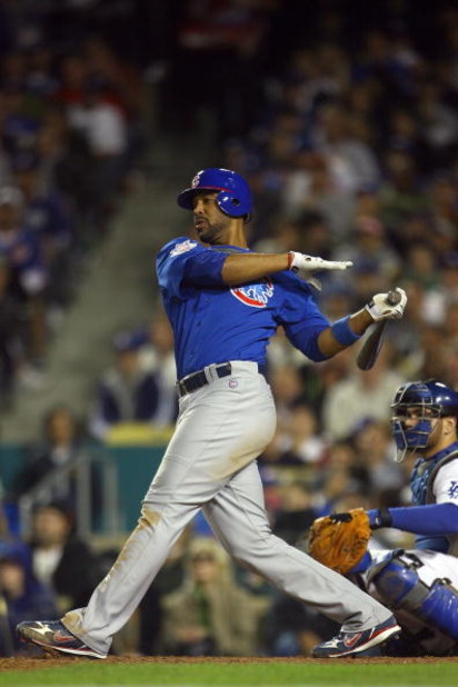 LOS ANGELES, CA - OCTOBER 04:  Derrek Lee #25 of the Chicago Cubs doubles to left in the eighth inning against the Los Angeles Dodgers in Game Three of the NLDS during the 2008 MLB playoffs on October 4, 2008 at Dodger Stadium in Los Angeles, California. 