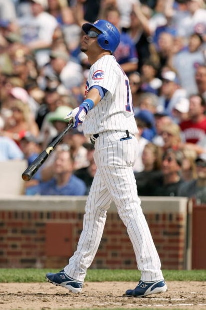 CHICAGO - JUNE 20:  Aramis Ramirez #16 of the Chicago Cubs follows his home run hit during the game against the Chicago White Sox on June 20, 2008 at Wrigley Field in Chicago, Illinois. The Cubs defeated the White Sox 4-3. (Photo by Jonathan Daniel/Getty 