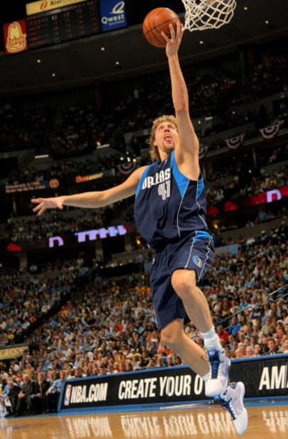 DENVER - MAY 03:  Dirk Nowitzki #41 of the Dallas Mavericks lays up a shot against the Denver Nuggets in Game One of the Western Conference Semifinals during the 2009 NBA Playoffs at Pepsi Center on May 3, 2009 in Denver, Colorado. NOTE TO USER: User expr