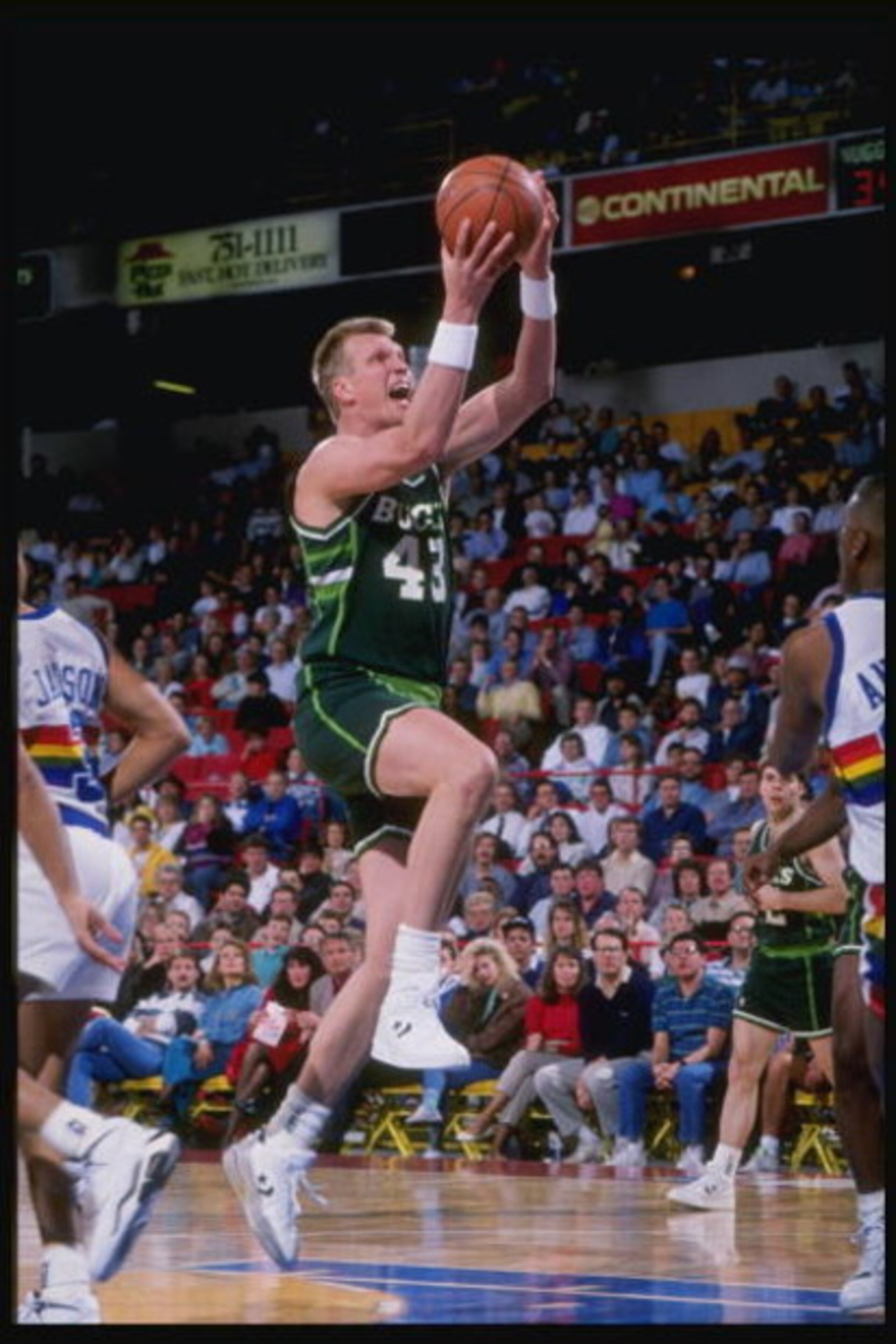 1990-1991:  Center Jack Sikma of the Milwaukee Bucks goes up for two during a game against the Denver Nuggets at McNichols Arena in Denver, Colorado. Mandatory Credit: Tim de Frisco  /Allsport
