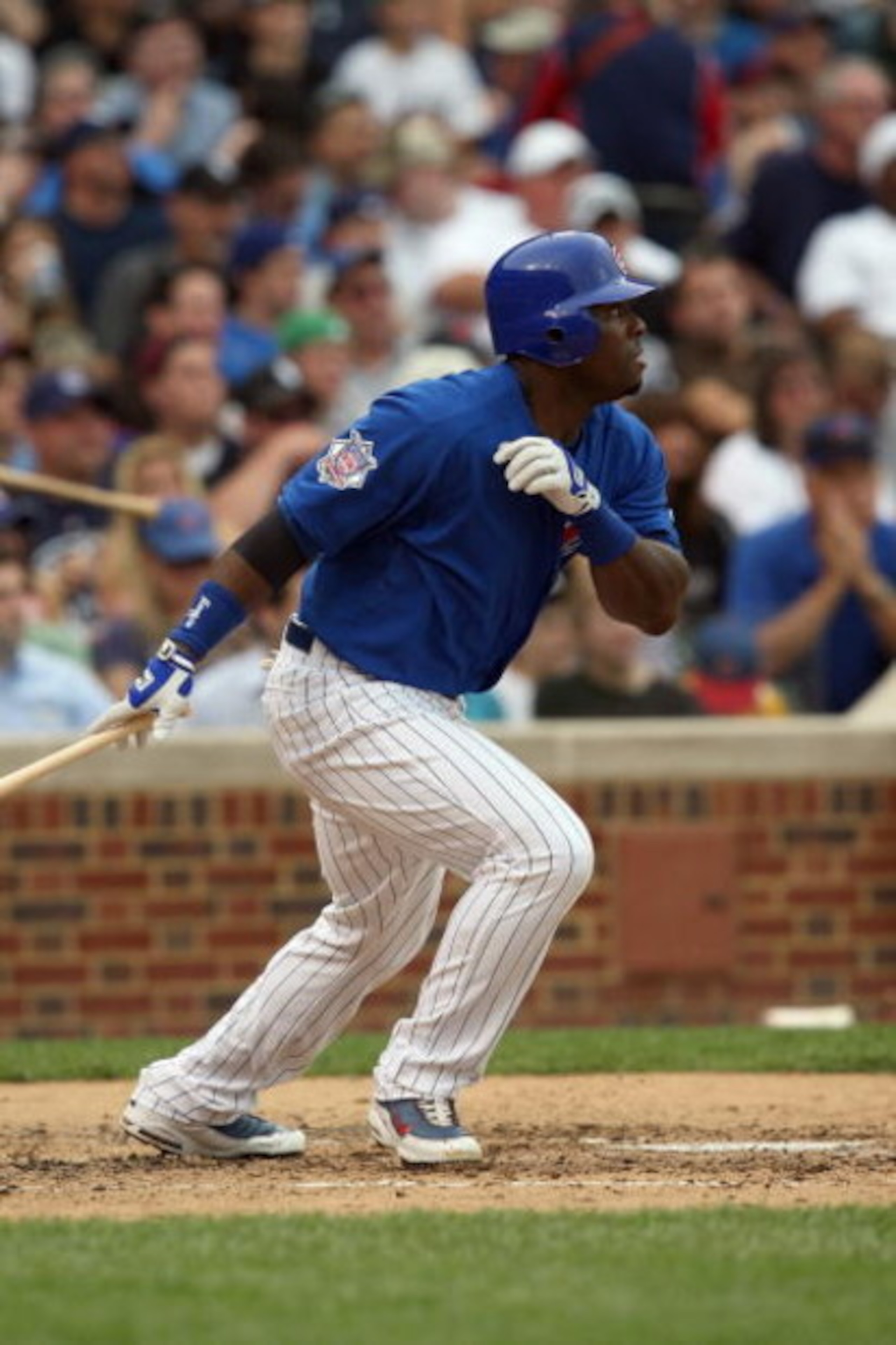 CHICAGO - JUNE 18:  Milton Bradley #21 of the Chicago Cubs bats against the Chicago White Sox during the game on June 18, 2009 at Wrigley Field in Chicago, Illinois. (Photo by Jonathan Daniel/Getty Images)