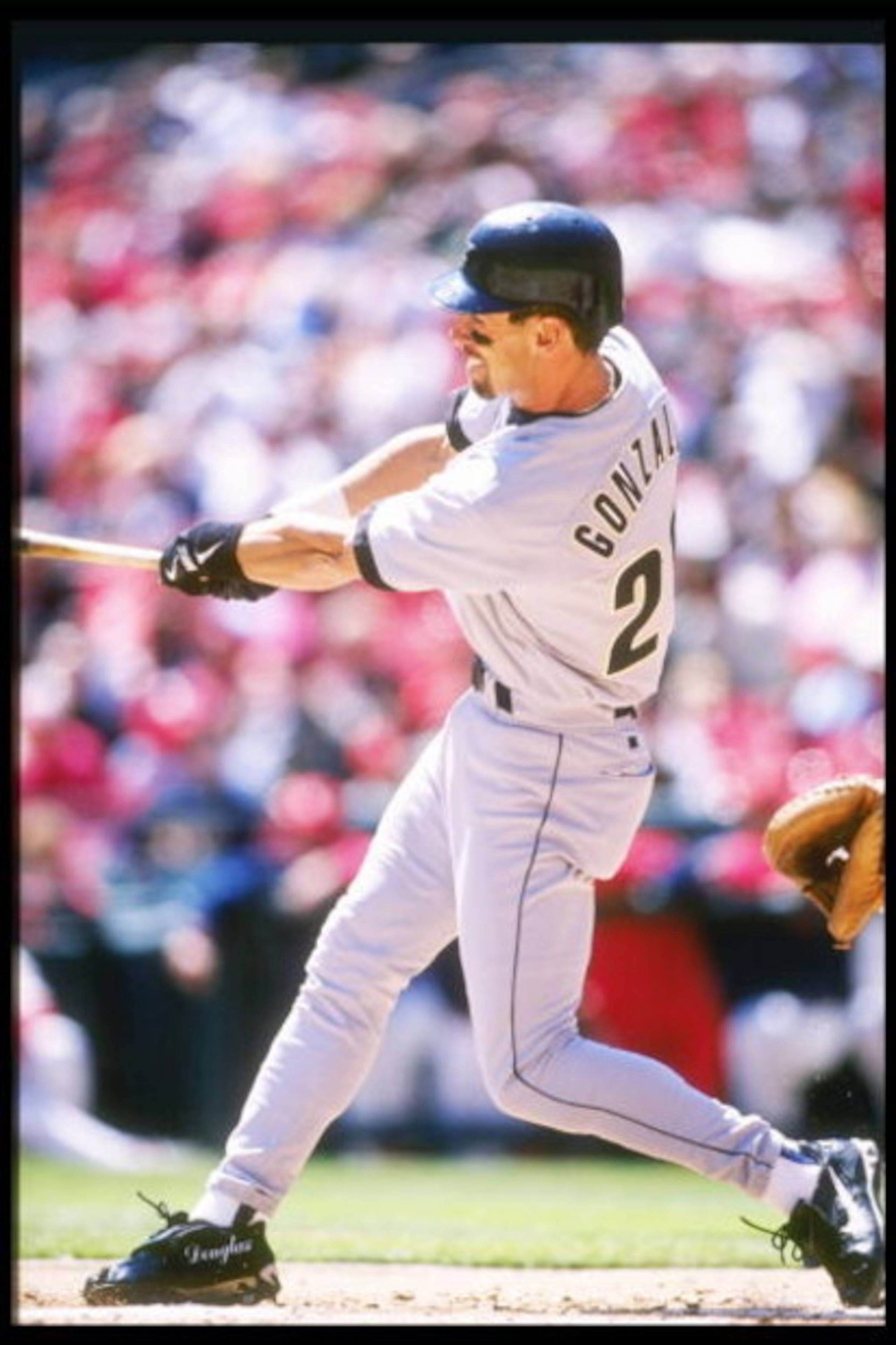 14 Apr 1997: Left fielder Luis Gonzalez of the Houston Astros swings at the ball during a game against the St. Louis Cardinals at Busch Stadium in St. Louis, Missouri. The Astros won the game 4-2.