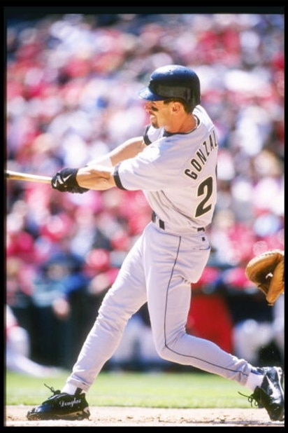 14 Apr 1997: Left fielder Luis Gonzalez of the Houston Astros swings at the ball during a game against the St. Louis Cardinals at Busch Stadium in St. Louis, Missouri. The Astros won the game 4-2.