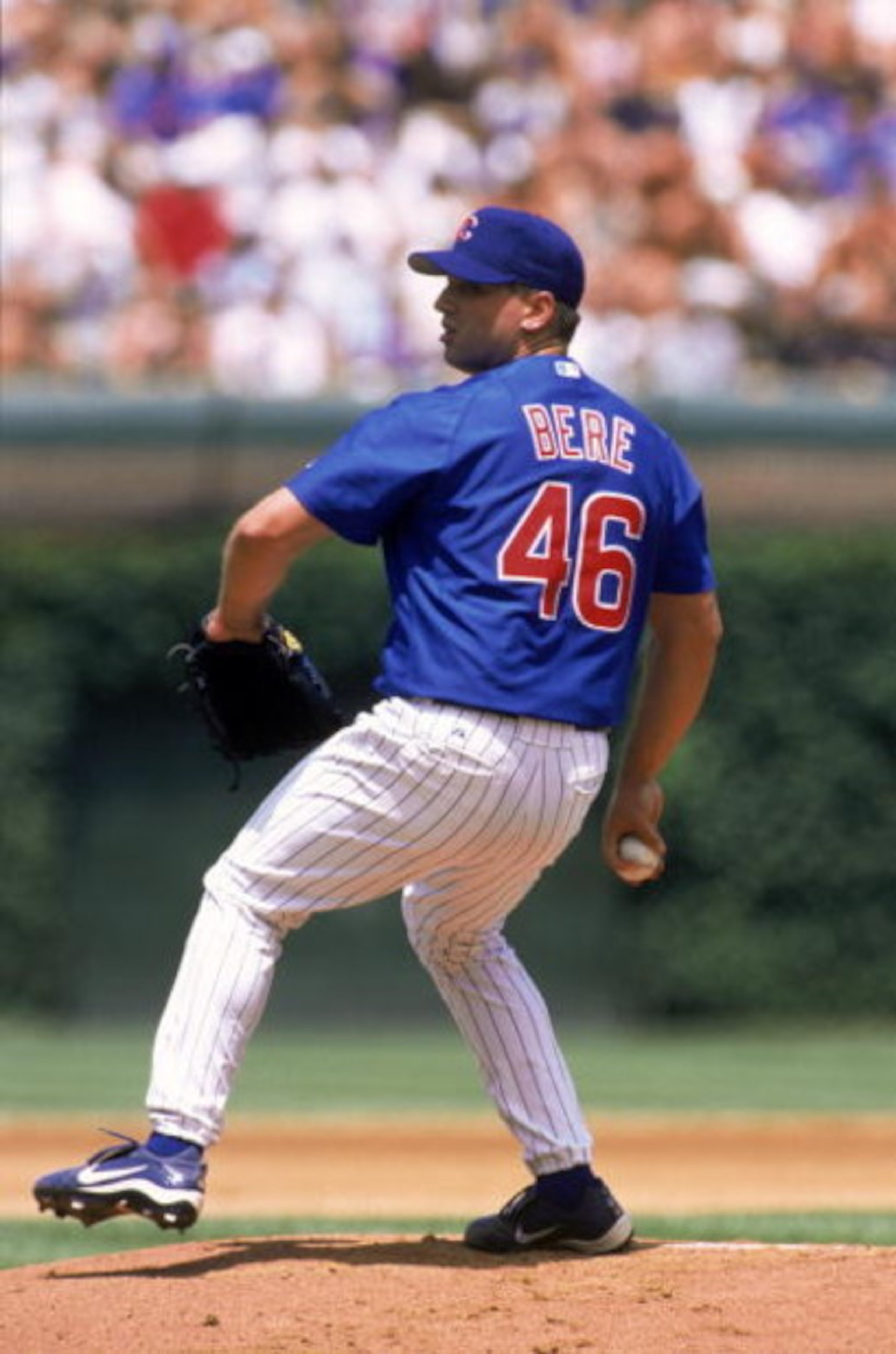 CHICAGO - JUNE 26:  Pitcher Jason Bere #46 of the Chicago Cubs throws a pitch during the MLB game against the Cincinnati Reds at Wrigley Field in Chicago, Illinois on June 16, 2002. The Reds defeated the Cubs 8-6.  (Photo by Jonathan Daniel/Getty Images)