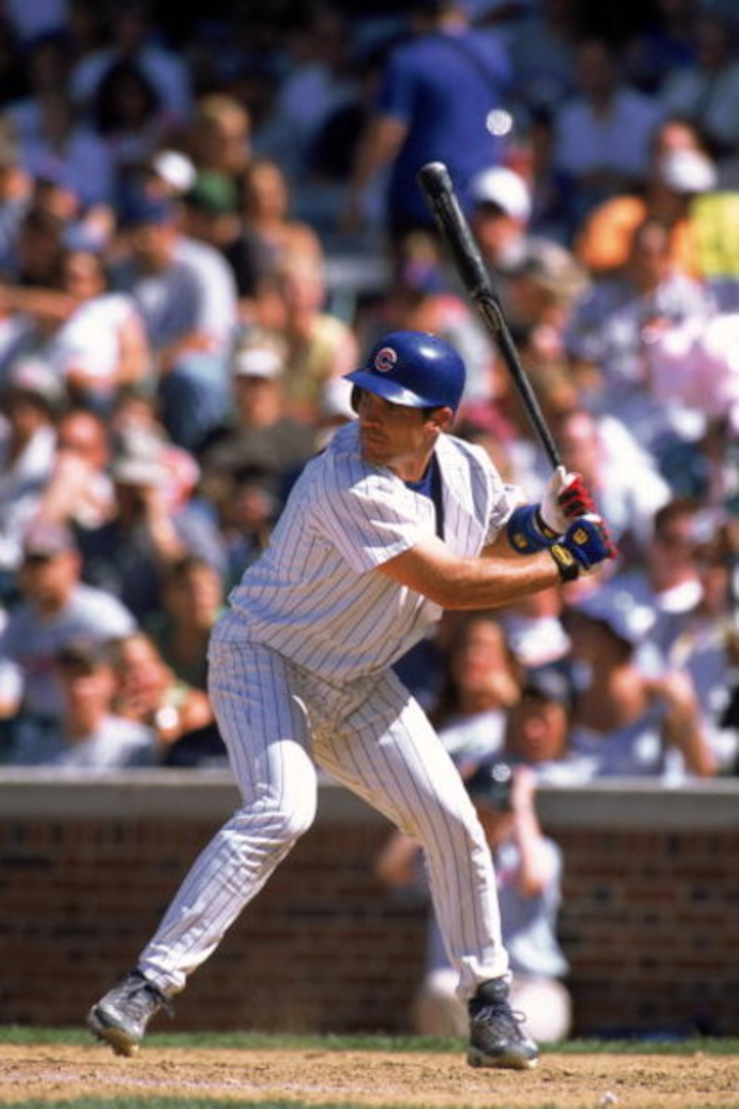 CHICAGO - JULY 26:  Catcher Todd Hundley #9 of the Chicago Cubs waits for the pitch during the MLB game against the Florida Marlins at Wrigley Field in Chicago, Illinois on July 12, 2002. The Cubs edged the Marlins 5-4 in 16 innings.  (Photo by Jonathan D