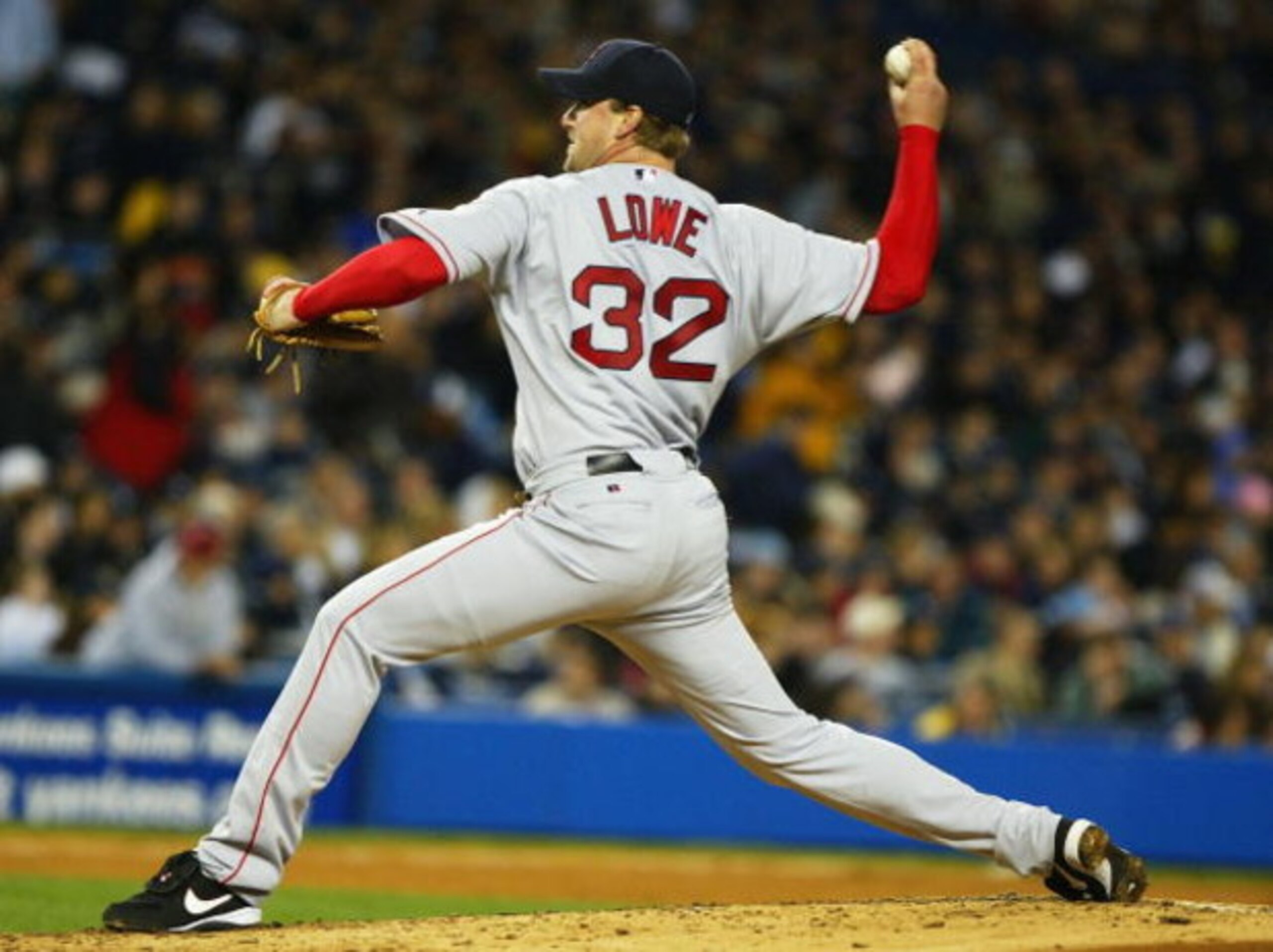 NEW YORK - APRIL 23:  Derek Lowe #32 of the Boston Red Sox pitches against the New York Yankees during their game on April 23, 2004 at Yankee Stadium in the Bronx borough of New York City.  (Photo by Al Bello/Getty Images)