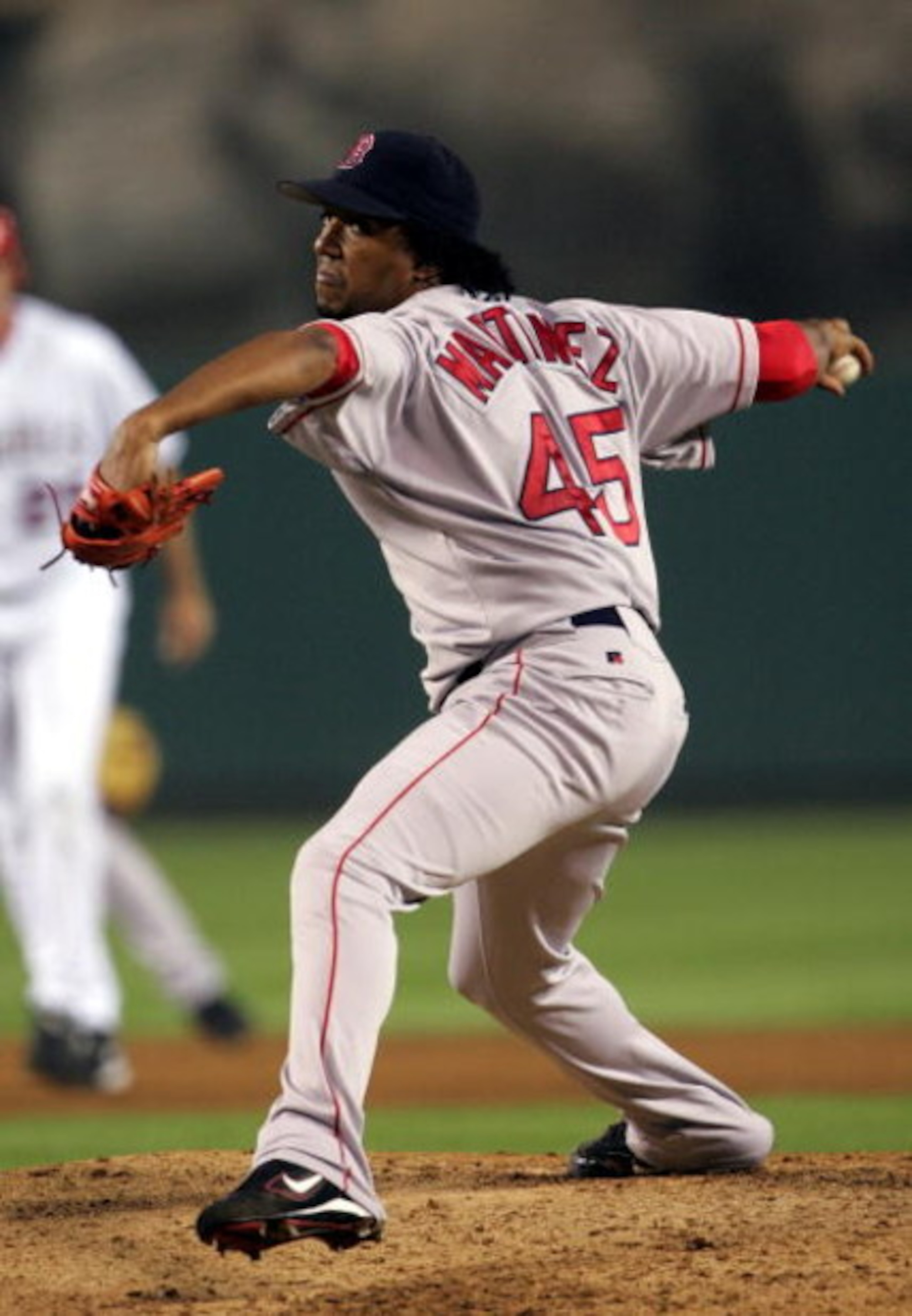 ANAHEIM, CA - OCTOBER 6:  Pitcher Pedro Martinez #45 of the Boston Red Sox delivers a pitch during the American League Division Series with the Anaheim Angels, Game Two on October 6, 2004 at Angels Stadium at Anaheim in Anaheim, California.   (Photo by St
