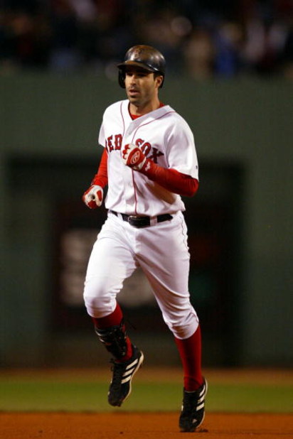BOSTON - OCTOBER 13:  Todd Walker #12 of the Boston Red Sox rounds the bases after hitting a home run in the bottom of the fourth inning of Game 4  of the 2003 American League Championship Series against the New York Yankees October 13, 2003 at Fenway Par