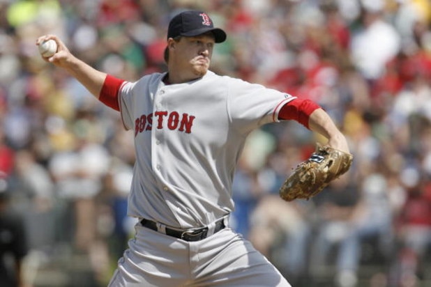 OAKLAND, CA - MAY 25:  Pitcher Mike Timlin #50 of the Boston Red Sox delivers a pitch during a game against the Oakland A's on May 25, 2008 at McAfee Coliseum in Oakland, California. Oakland won 6-3.  (Photo by Greg Trott/Getty Images)