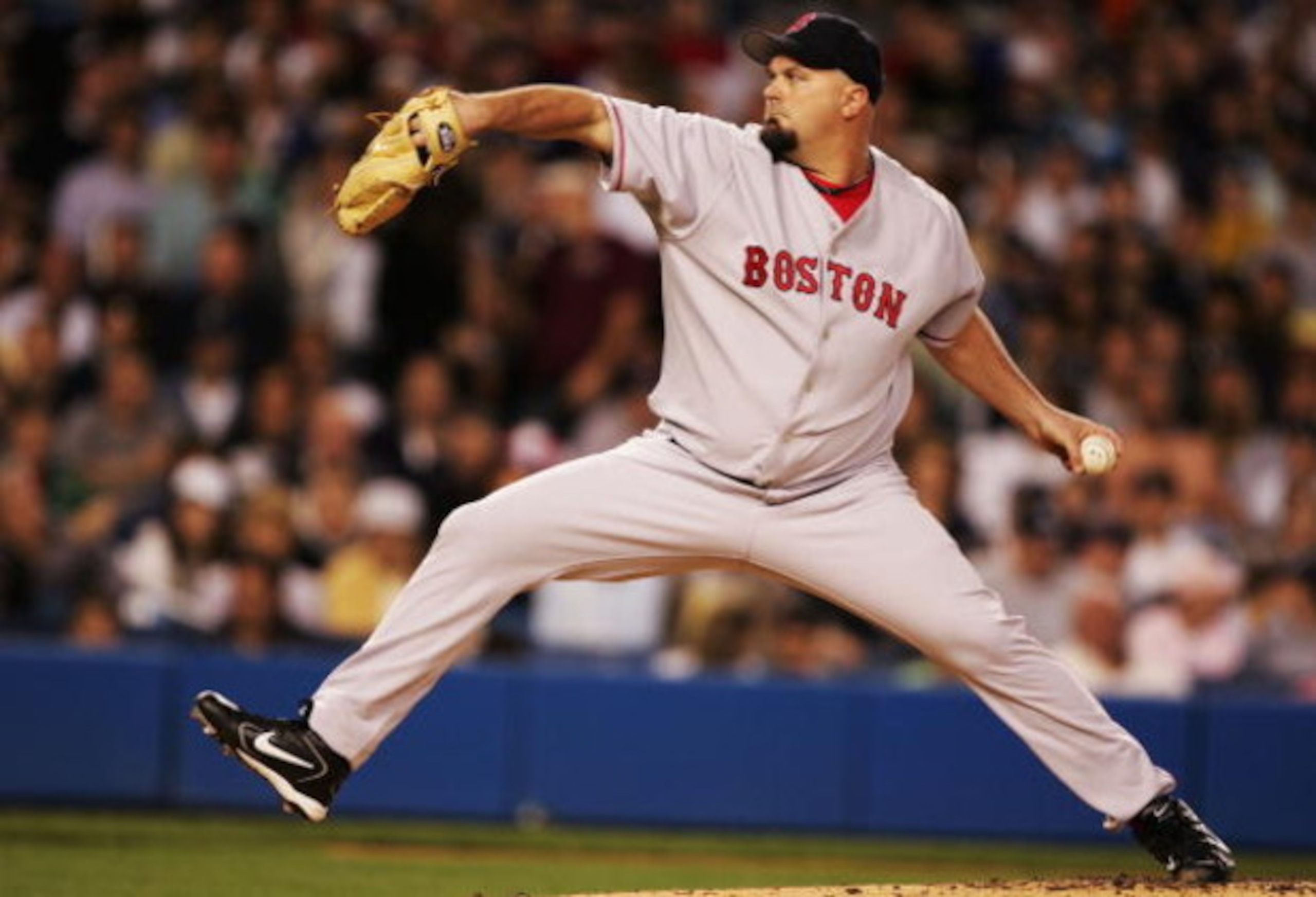NEW YORK - MAY 29:  Starting pitcher David Wells #16 of the Boston Red Sox delivers in the first inning against the New York Yankees at Yankee Stadium on May 29, 2005 in the Bronx borough of New York City.  (Photo by Al Bello/Getty Images)