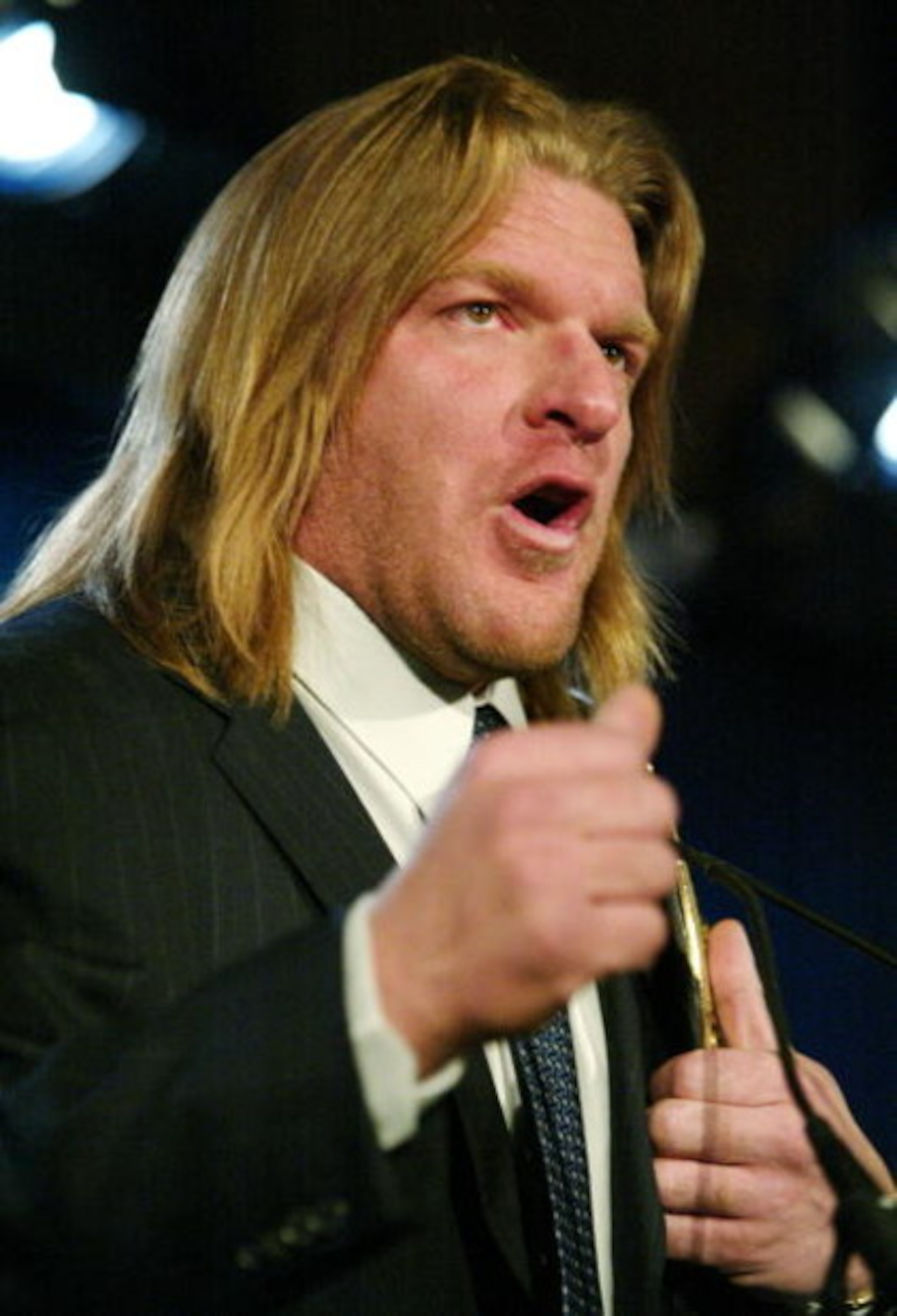 NEW YORK - MARCH 11:  Wrestler Triple H attends a press conference to promote Wrestlemania XX at Planet Hollywood March 11, 2004 in New York City.  (Photo by Peter Kramer/Getty Images)