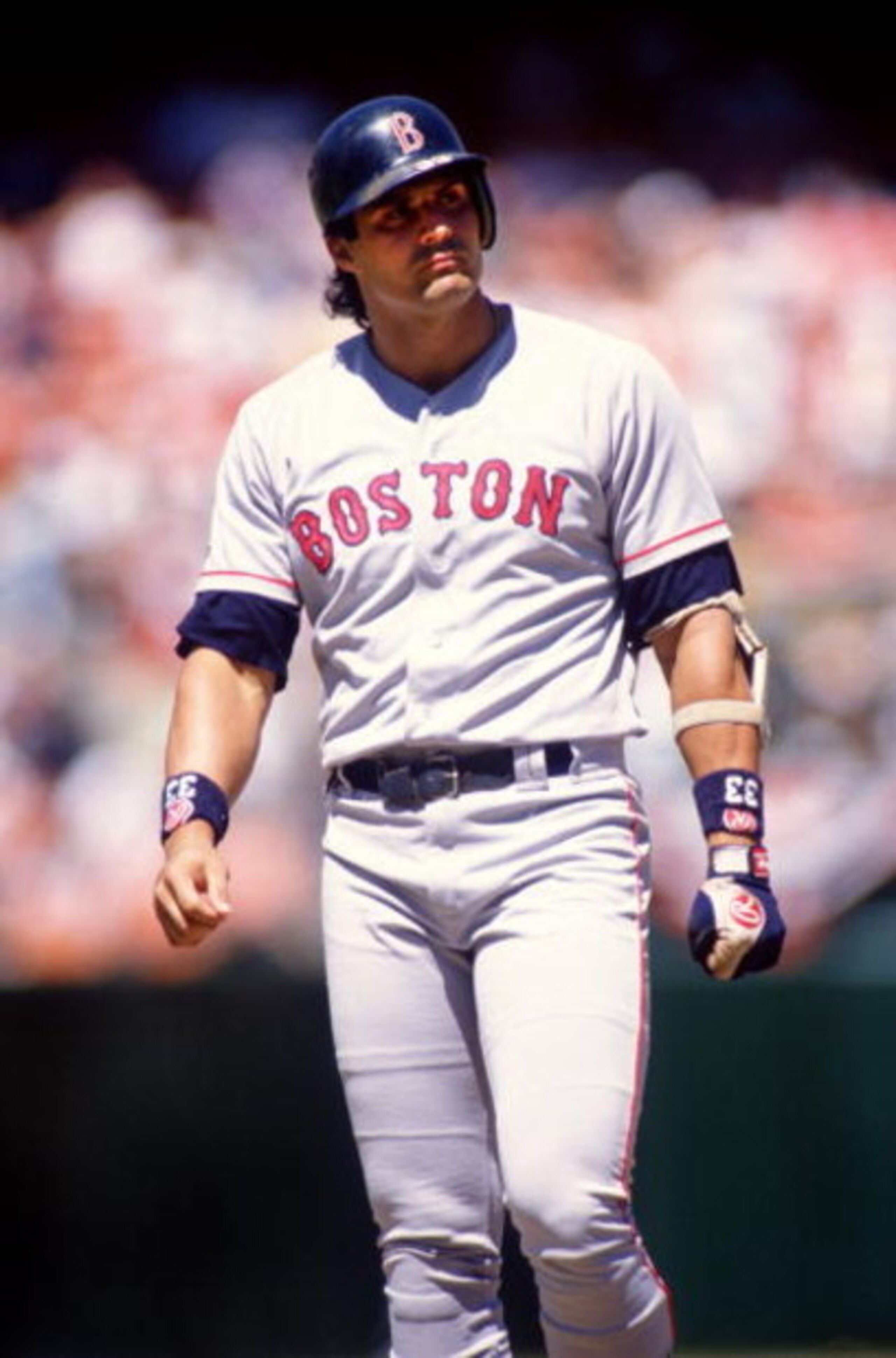 27 AUG 1995:  BOSTON DESIGNATED HITTER AND OUTFIELDER JOSE CANSECOAFTER AN AT-BATT DURING THE RED SOX 4-1 VICTORY OVER THE OAKLAND ATHLETICS AT THE OAKLAND ALAMEDA COLISEUM IN OAKLAND, CALIFORNIA. Mandatory Credit: Otto Greule/ALLSPORT