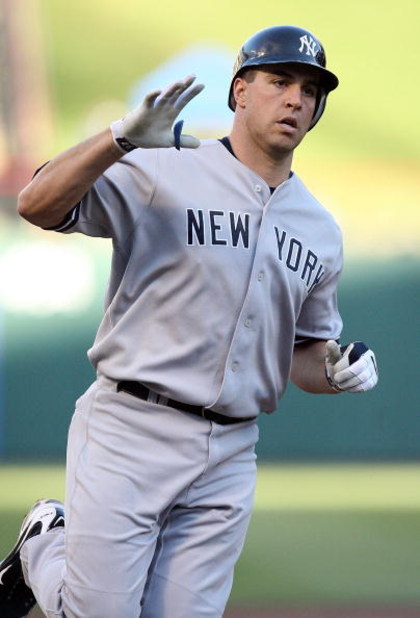 ARLINGTON, TX - MAY 27:  Mark Teixeira #25 of the New York Yankees celebrates a two run homerun against the Texas Rangers in the first inning on May 27, 2009 at Rangers Ballpark in Arlington, Texas.  (Photo by Ronald Martinez/Getty Images)