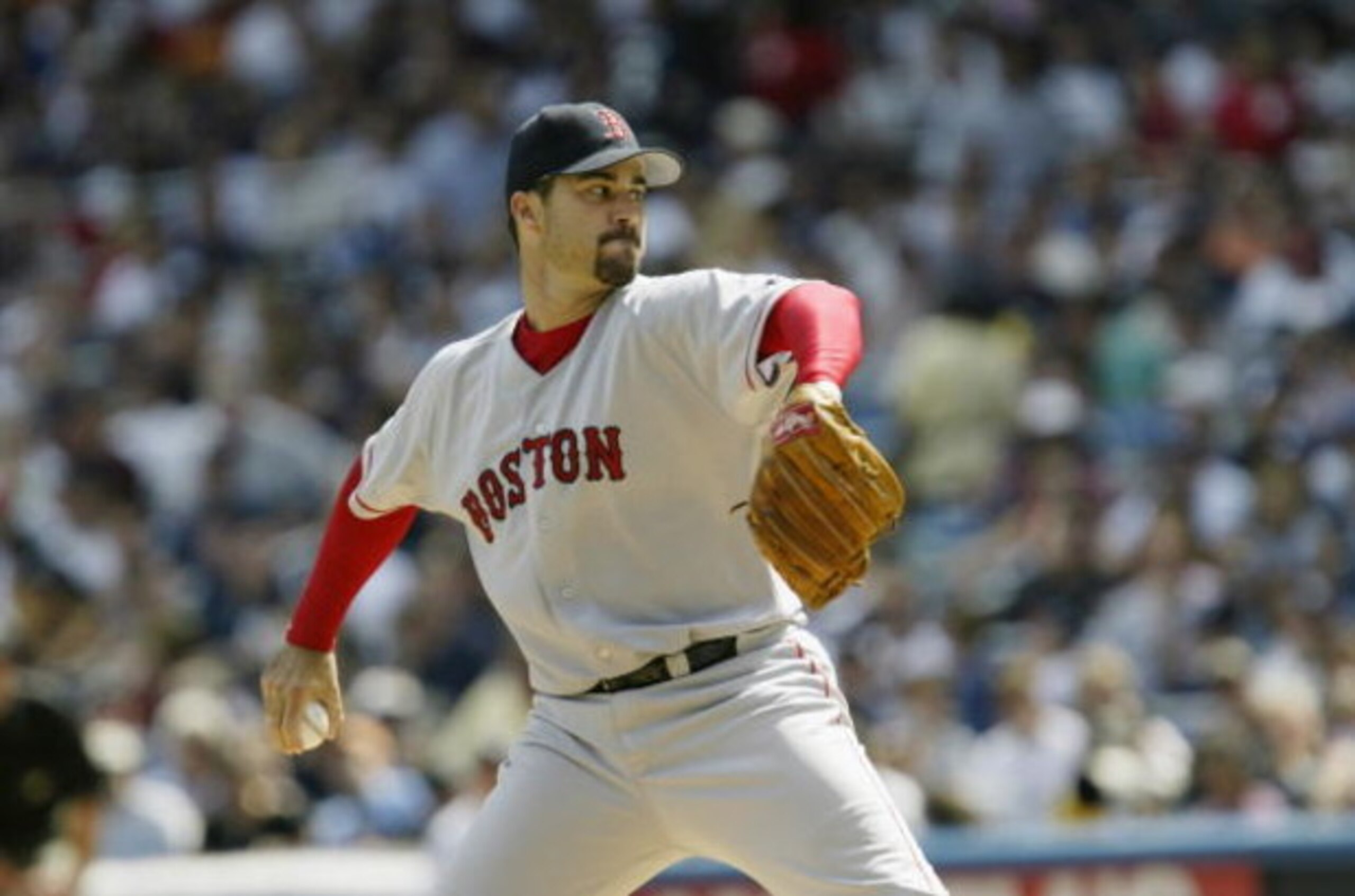 BRONX, NY - SEPTEMBER 7:  Pitcher Jeff Suppan #37 of the Boston Red Sox throws against the New York Yankees at Yankee Stadium on September 7, 2003 in the Bronx, New York. The Yankees defeated the Red Sox 3-1. (Photo by Chris Trotman/Getty Images)