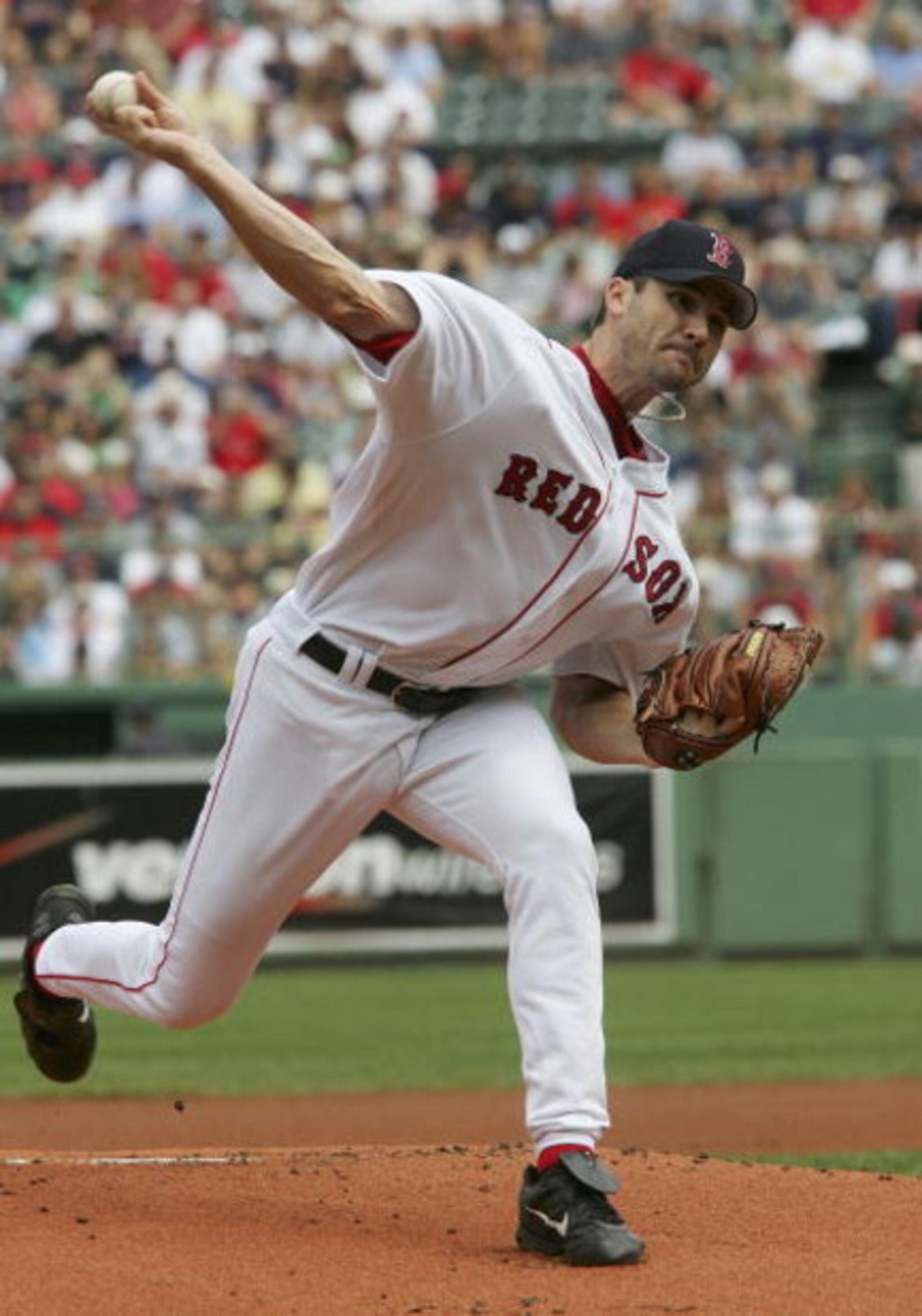 BOSTON - AUGUST 18: Jason Johnson #18 of the Boston Red Sox pitches against the New York Yankees on August 18, 2006 at Fenway Park in Boston Massachusetts.  (Photo by Jim McIsaac/Getty Images)