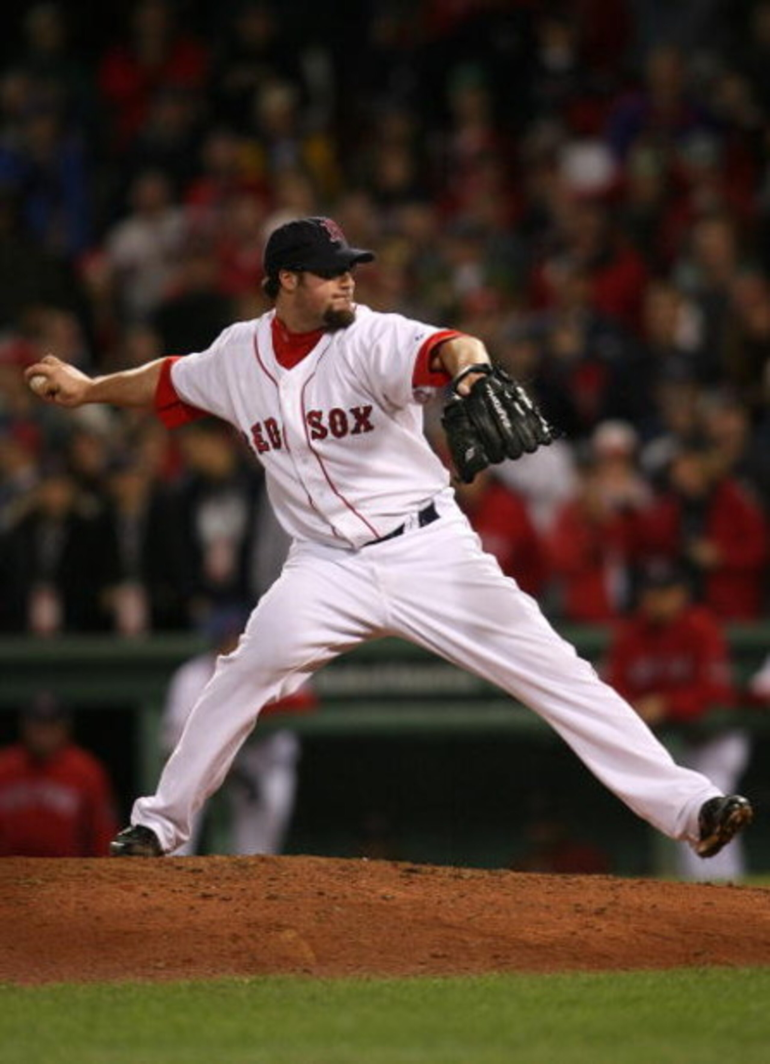 BOSTON - OCTOBER 24:  Eric Gagne #83 of the Boston Red Sox pitches in the ninth inning of Game One of the 2007 Major League Baseball World Series against Colorado Rockies at Fenway Park on October 24, 2007 in Boston, Massachusetts.  (Photo by Nick Laham/G